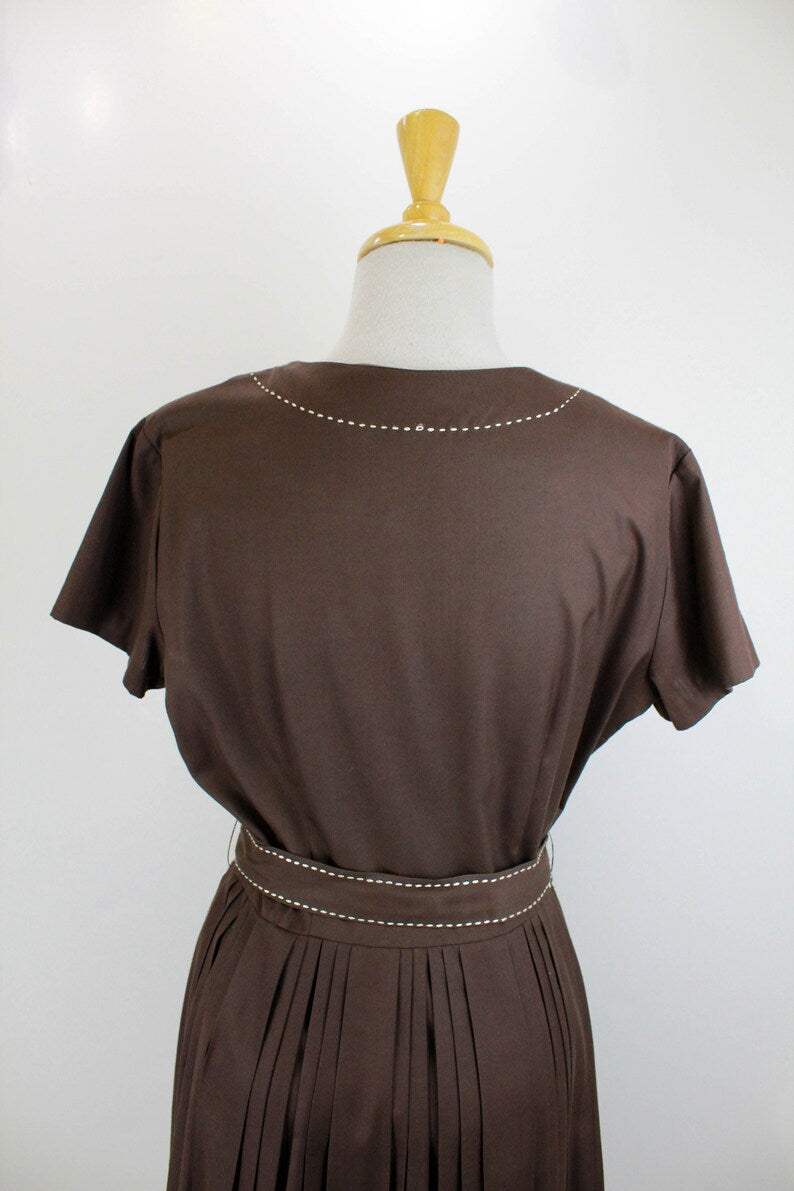 1950s brown cotton shirtwaist dress with contrast stitching, belt, button up front and pleated skirt