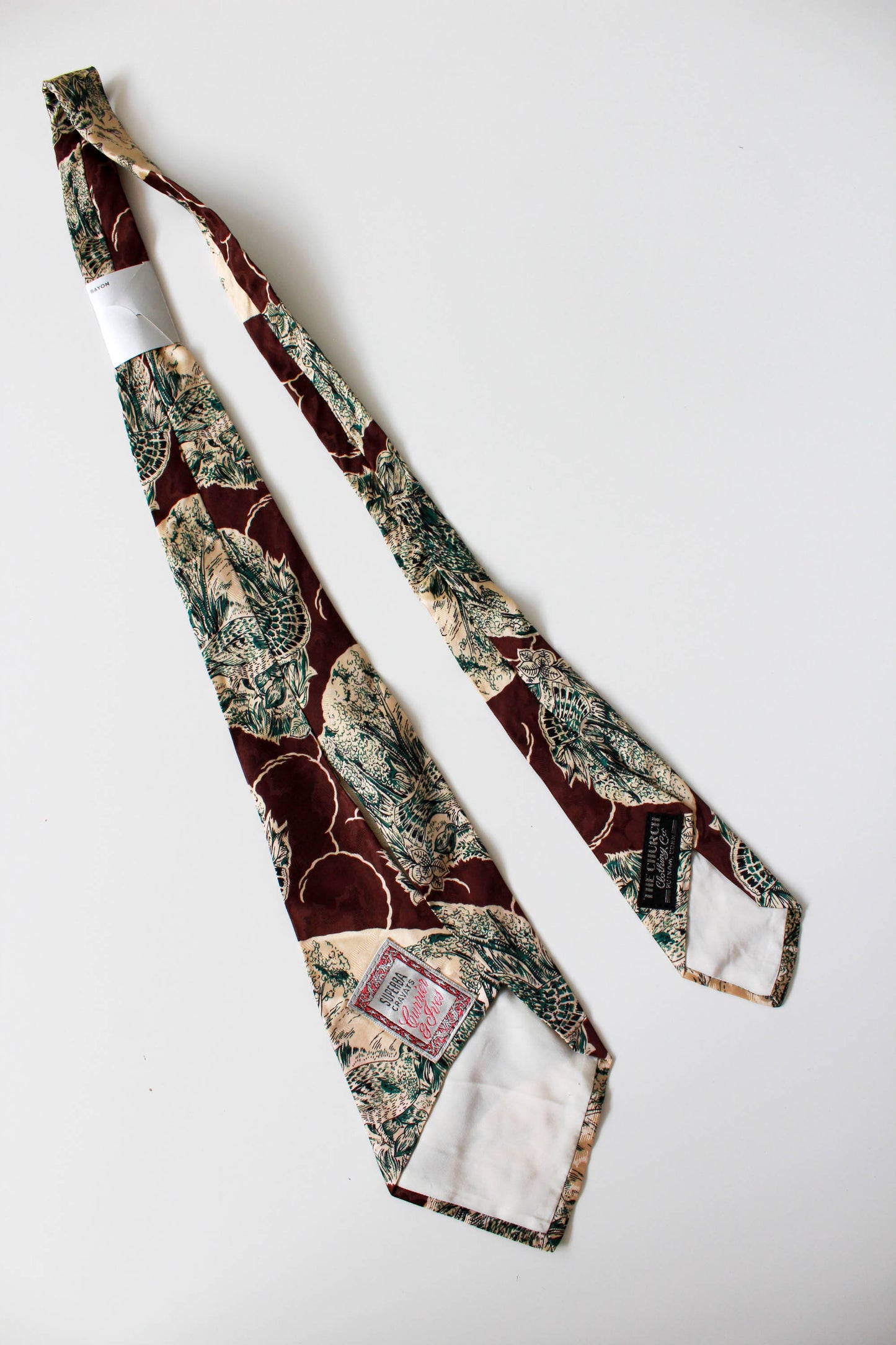 1940s superba rayon necktie, brown with green and beige bird and landscape illustration, wide tongue rayon tie