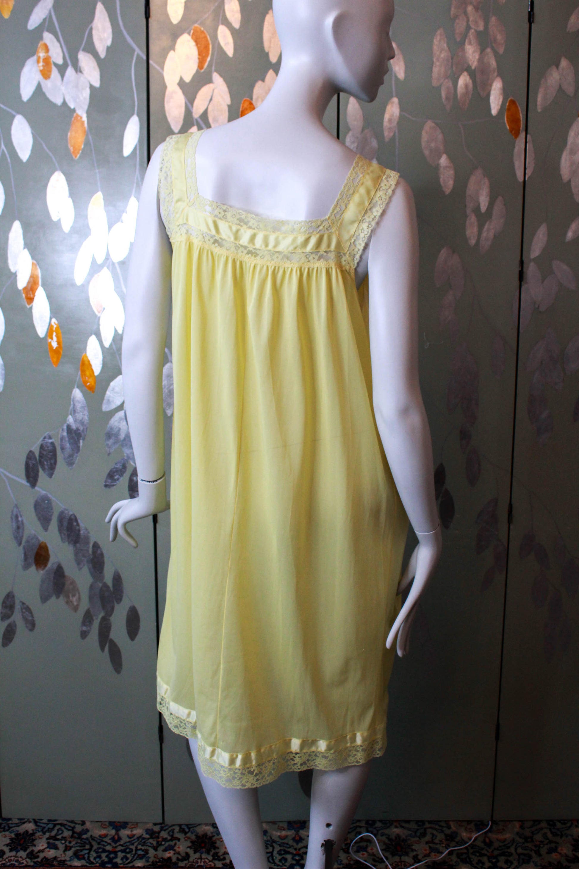1960s lemon yellow night gown with lace trim and a bow coquette aesthetic vintage