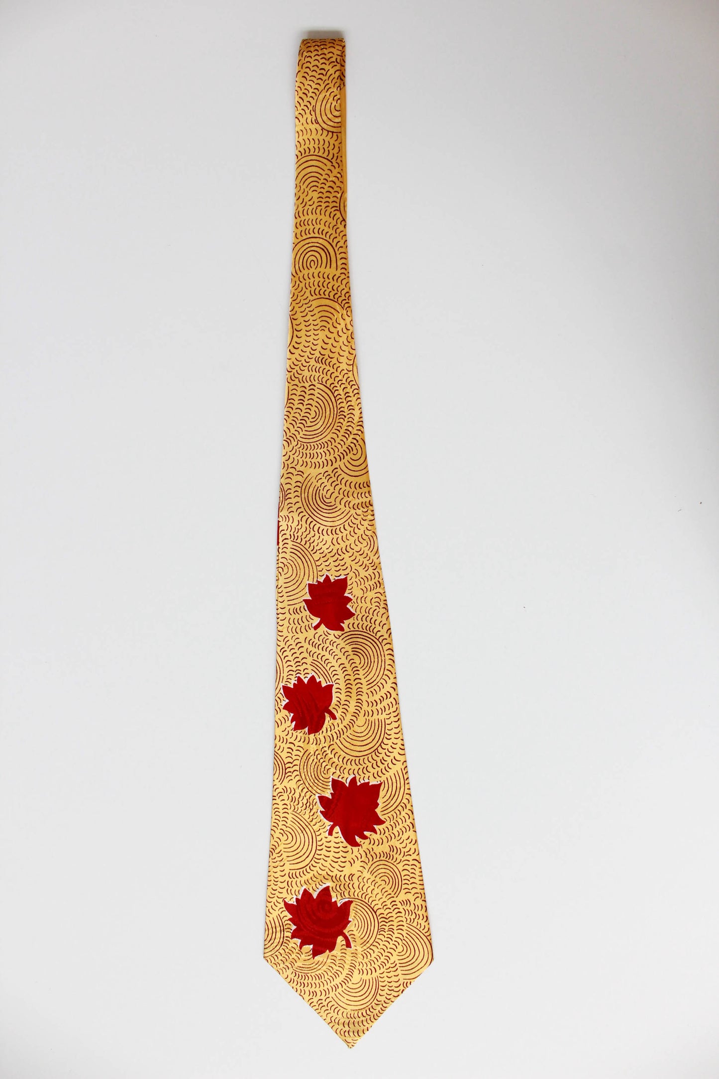 1940s red leaf print yellow rayon necktie, wide tongue bold look swing tie by aristocrat cravat