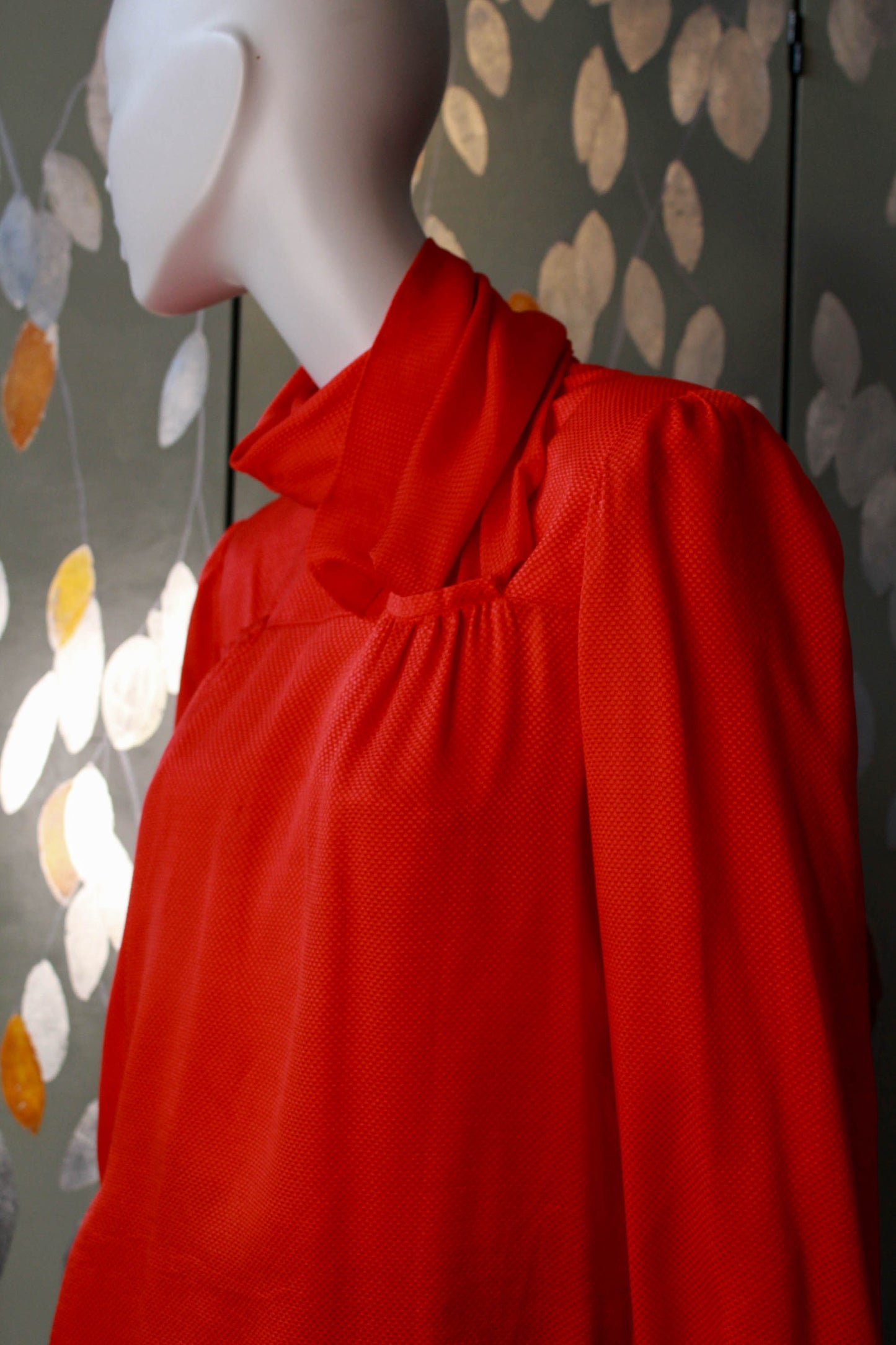 1980s red silk valentino blouse with high scarf neck collar tucked into pocket, gathered bustline, long sleeves