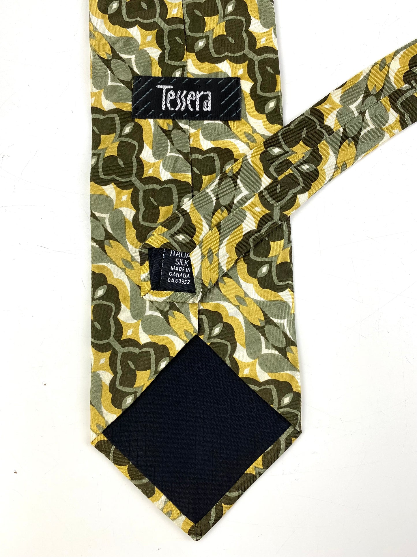 Back and labels of: 90s Deadstock Silk Necktie, Men's Vintage Green/ Yellow Abstract Pattern Tie, NOS