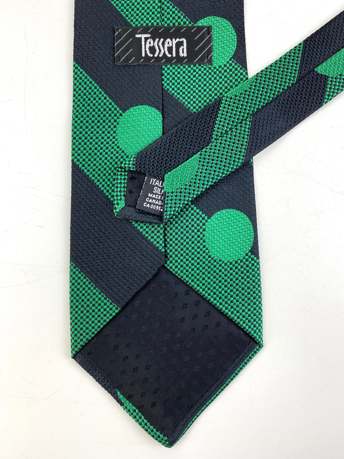 Back and labels of: 90s Deadstock Silk Necktie, Men's Vintage Green/ Black Diagonal Stripe Polka Dot Pattern Tie, NOS