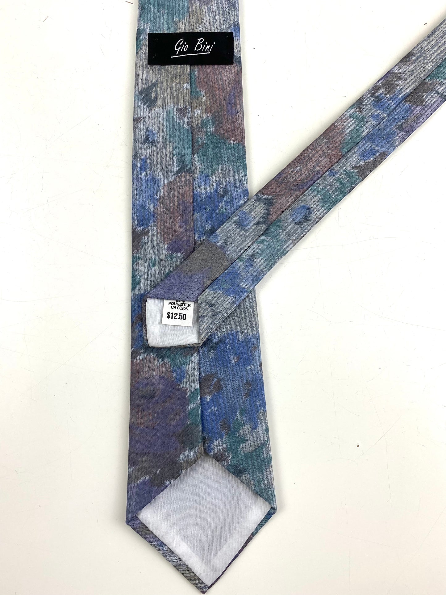 Back and labels of: 80s Deadstock Necktie, Men's Vintage Purple Grey Floral Pattern Tie, NOS