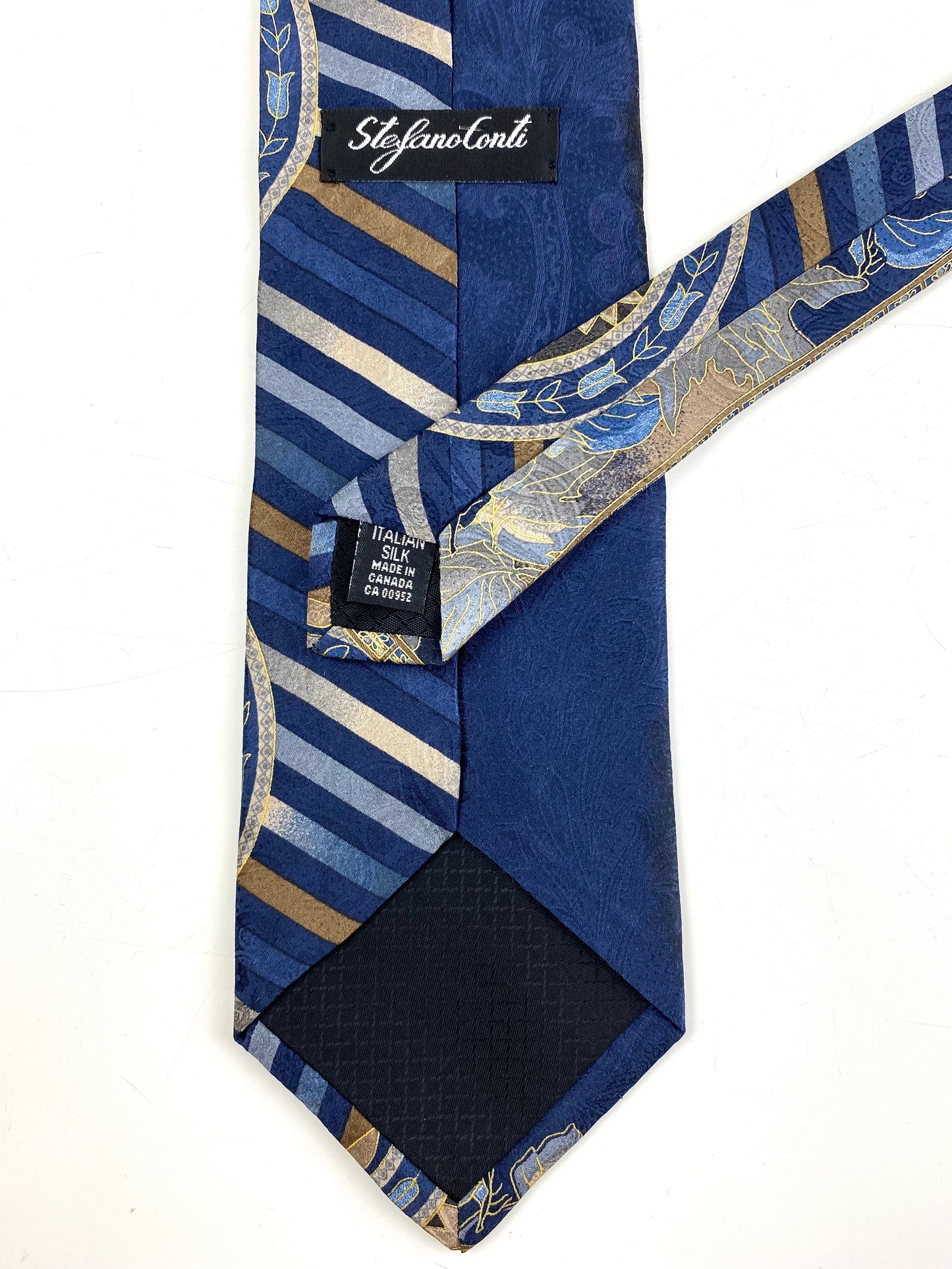 Back and labels of: 90s Deadstock Silk Necktie, Men's Vintage Blue/Taupe Oriental Foliage Pattern Tie, NOS