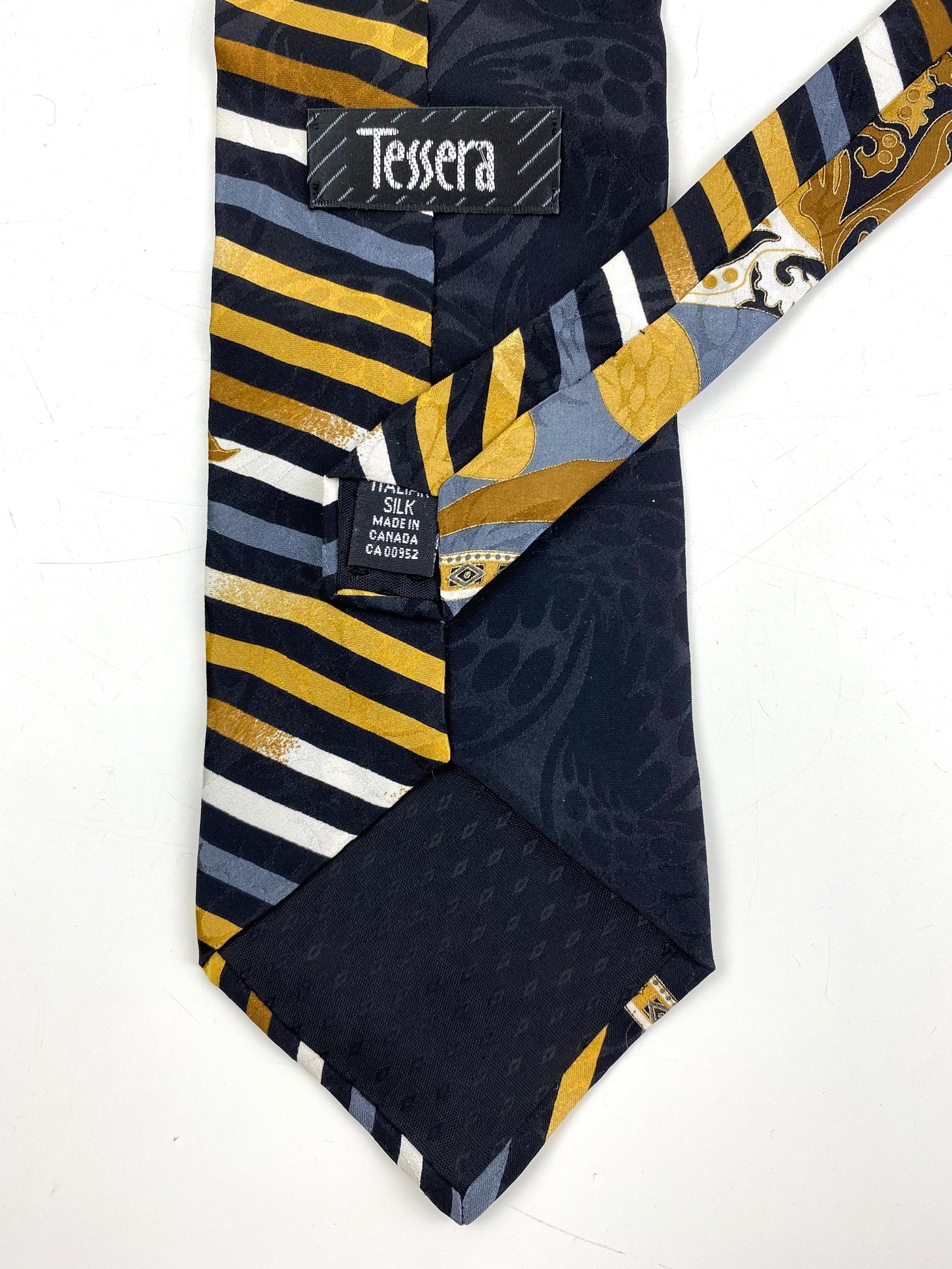 Back and labels of: 90s Deadstock Silk Necktie, Men's Vintage Black/Grey/Gold Oriental Pattern Tie, NOS