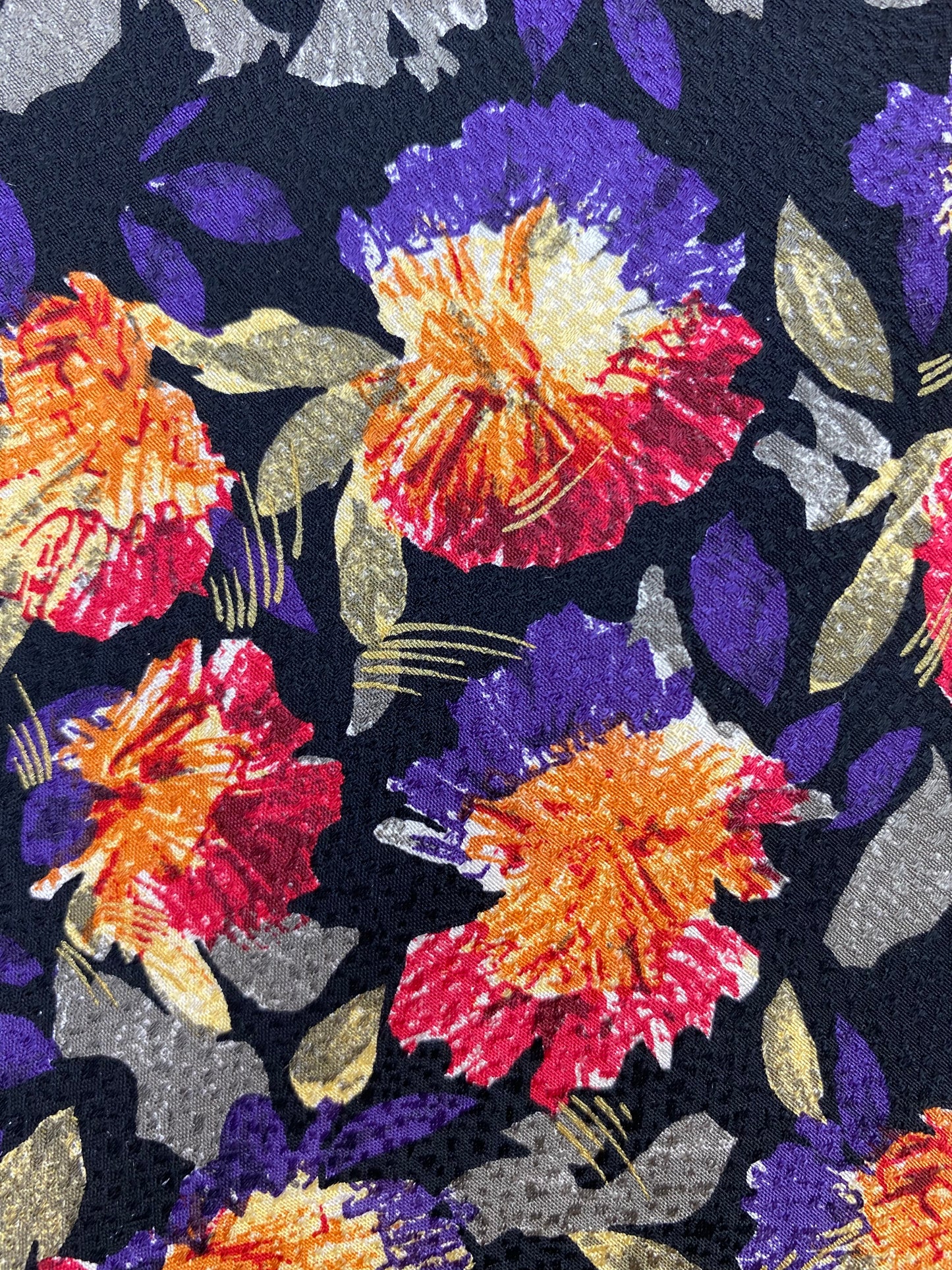 Close-up detail of: 90s Deadstock Silk Necktie, Men's Vintage Purple/ Orange/ Pink Floral Pattern Tie, NOS