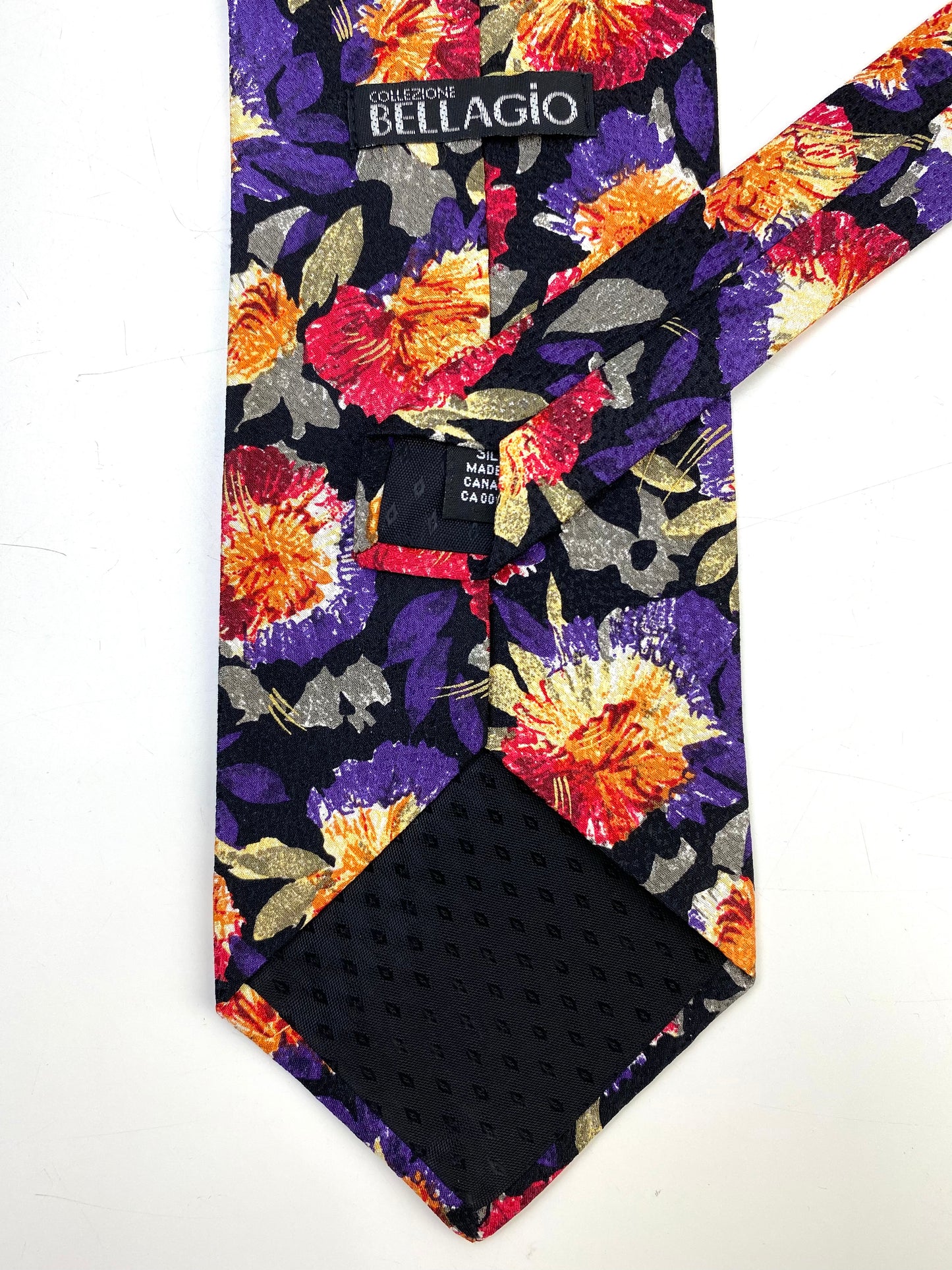 Back and labels of: 90s Deadstock Silk Necktie, Men's Vintage Purple/ Orange/ Pink Floral Pattern Tie, NOS