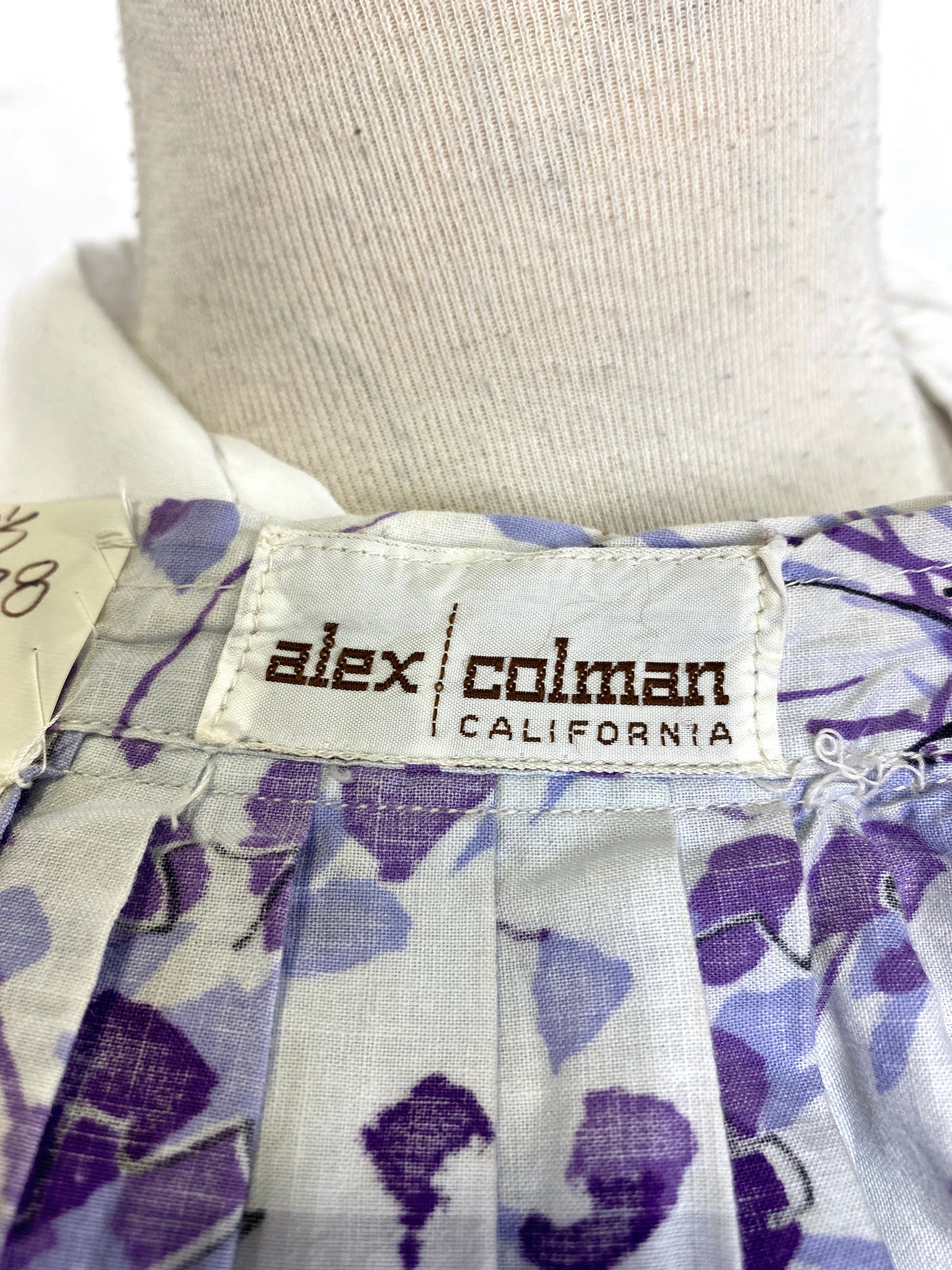 Alex Colman California clothing label on 1950s print skirt. Ian Drummond Vintage.