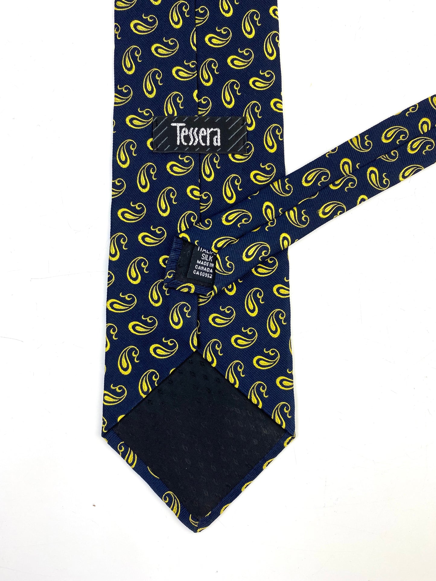 Back and labels of: 90s Deadstock Silk Necktie, Men's Vintage Gold Navy Modern Boteh Paisley Pattern Tie, NOS