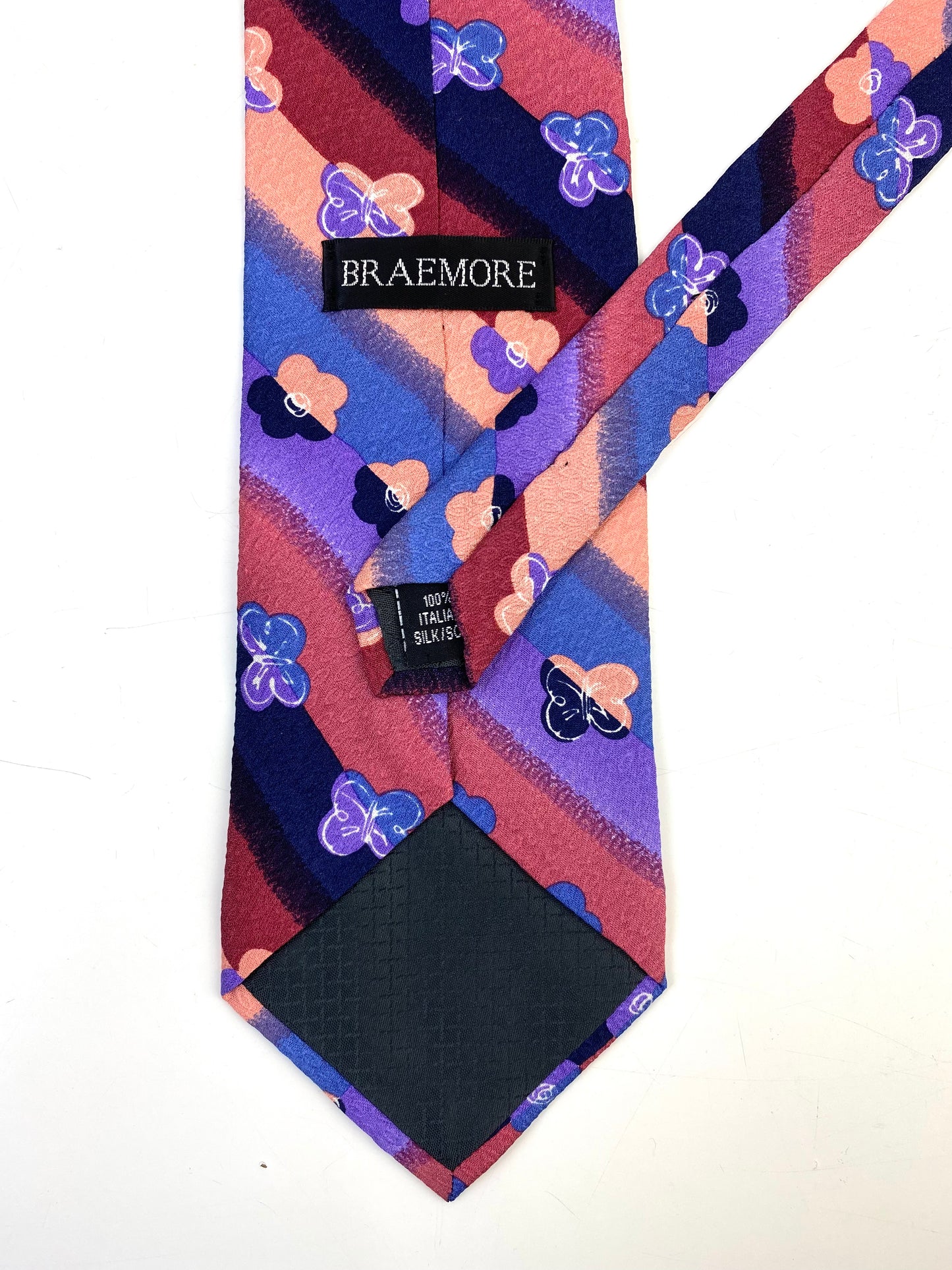 Back and labels of: 90s Deadstock Silk Necktie, Men's Vintage Pink/ Purple/ Blue Floral Butterfly Stripe Pattern Tie, NOS