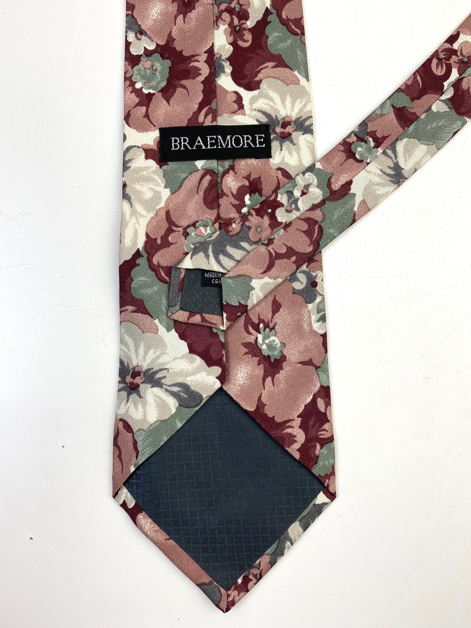 Back and labels of: 90s Deadstock Silk Necktie, Men's Vintage Wine/ Green Floral Pattern Tie, NOS