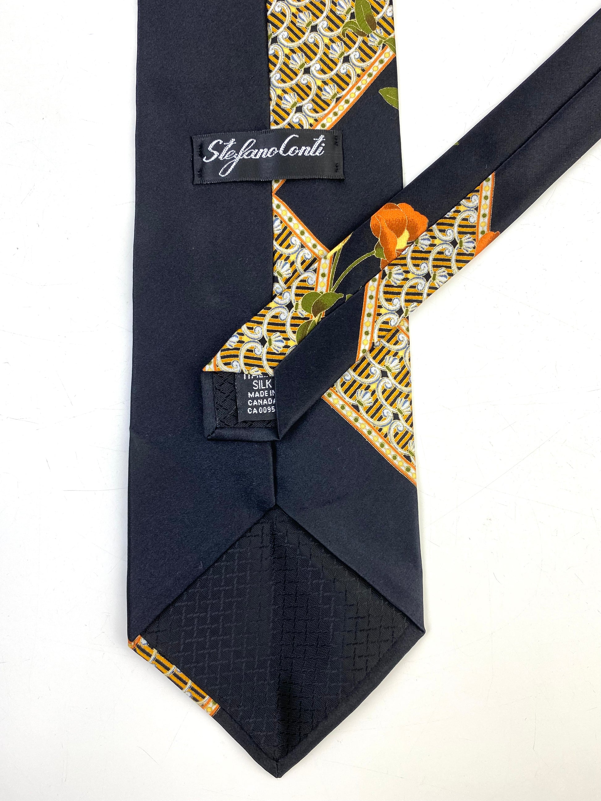 Back and labels of: 90s Deadstock Silk Necktie, Men's Vintage Gold/ Orange/ Black Oriental Floral Pattern Tie, NOS