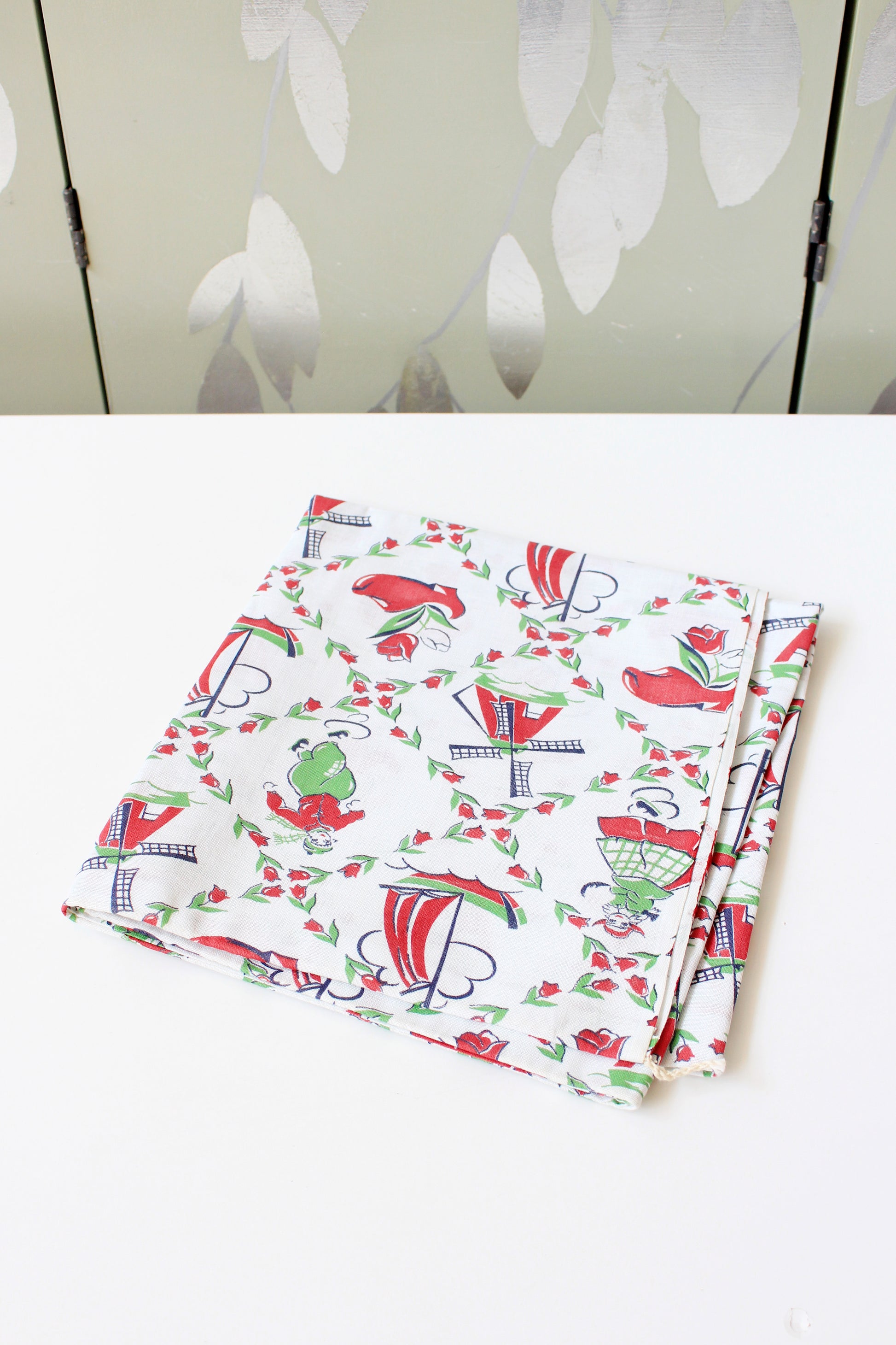 1940s Red And Green Dutch Illustration Feedsack featuring Ice Skaters And Windmills, Vintage Sewing/Quilting Fabric