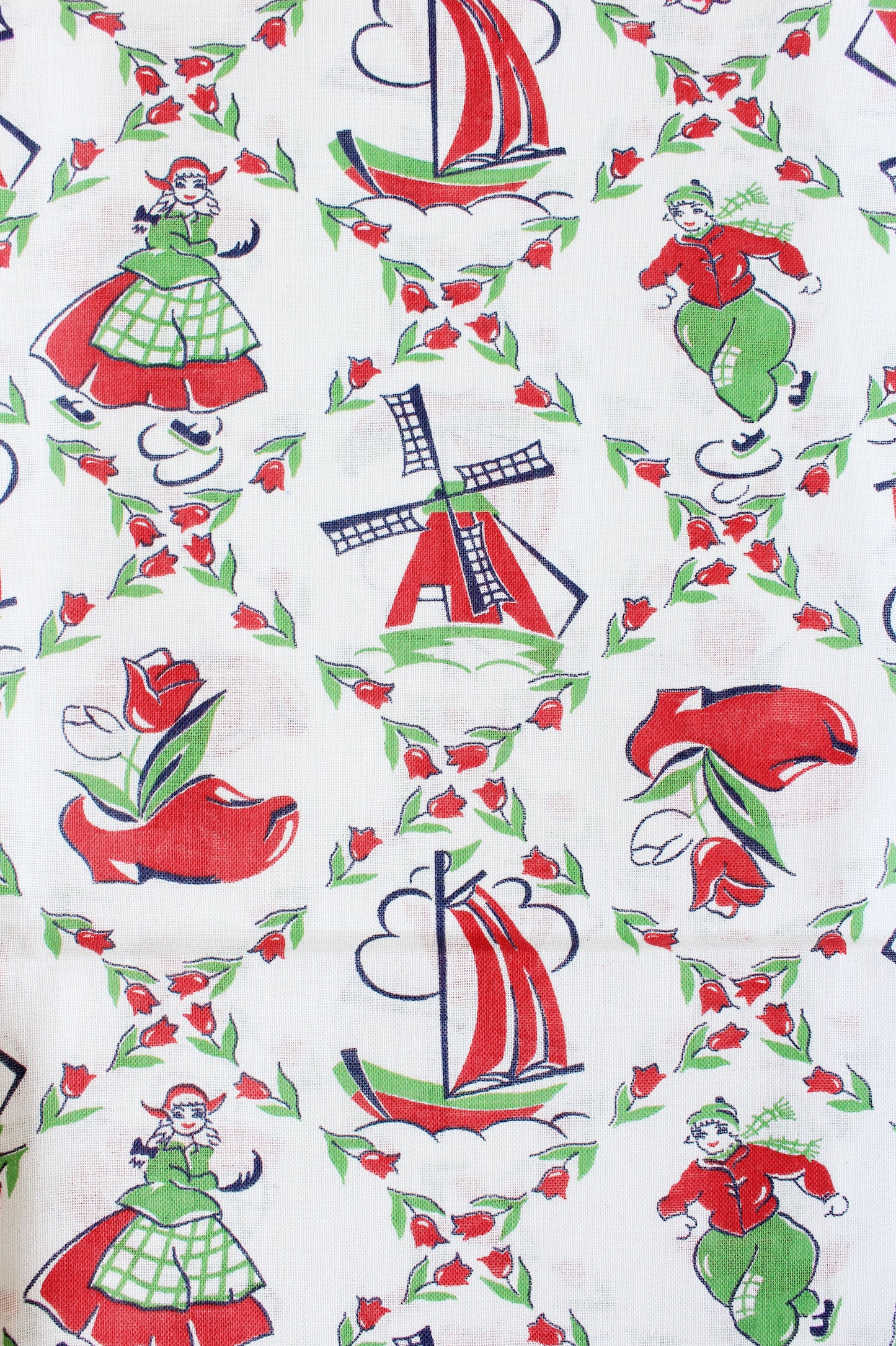 1940s Red And Green Dutch Illustration Feedsack featuring Ice Skaters And Windmills, Vintage Sewing/Quilting Fabric