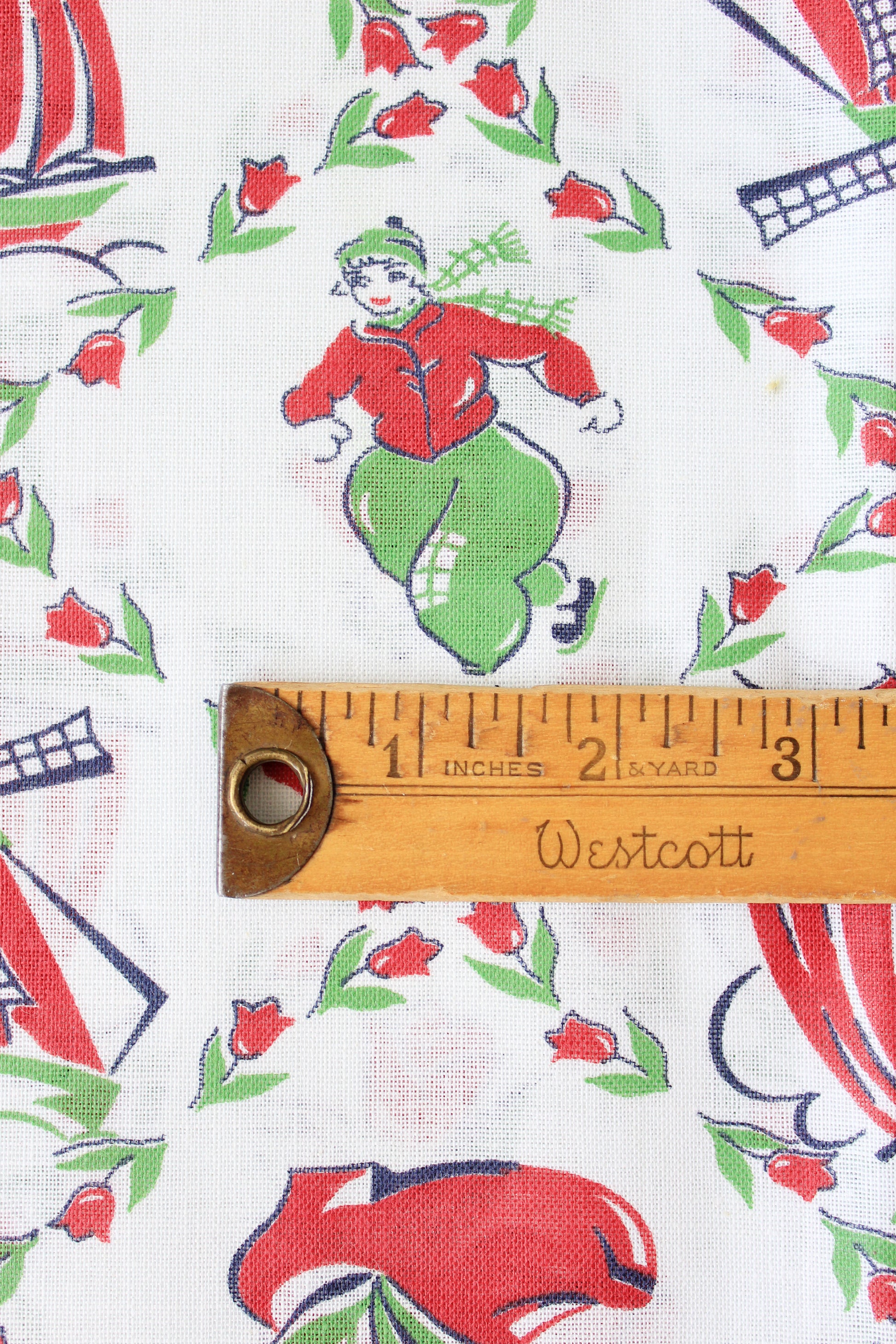 1940s Red And Green Dutch Illustration Feedsack featuring Ice Skaters And Windmills, Vintage Sewing/Quilting Fabric