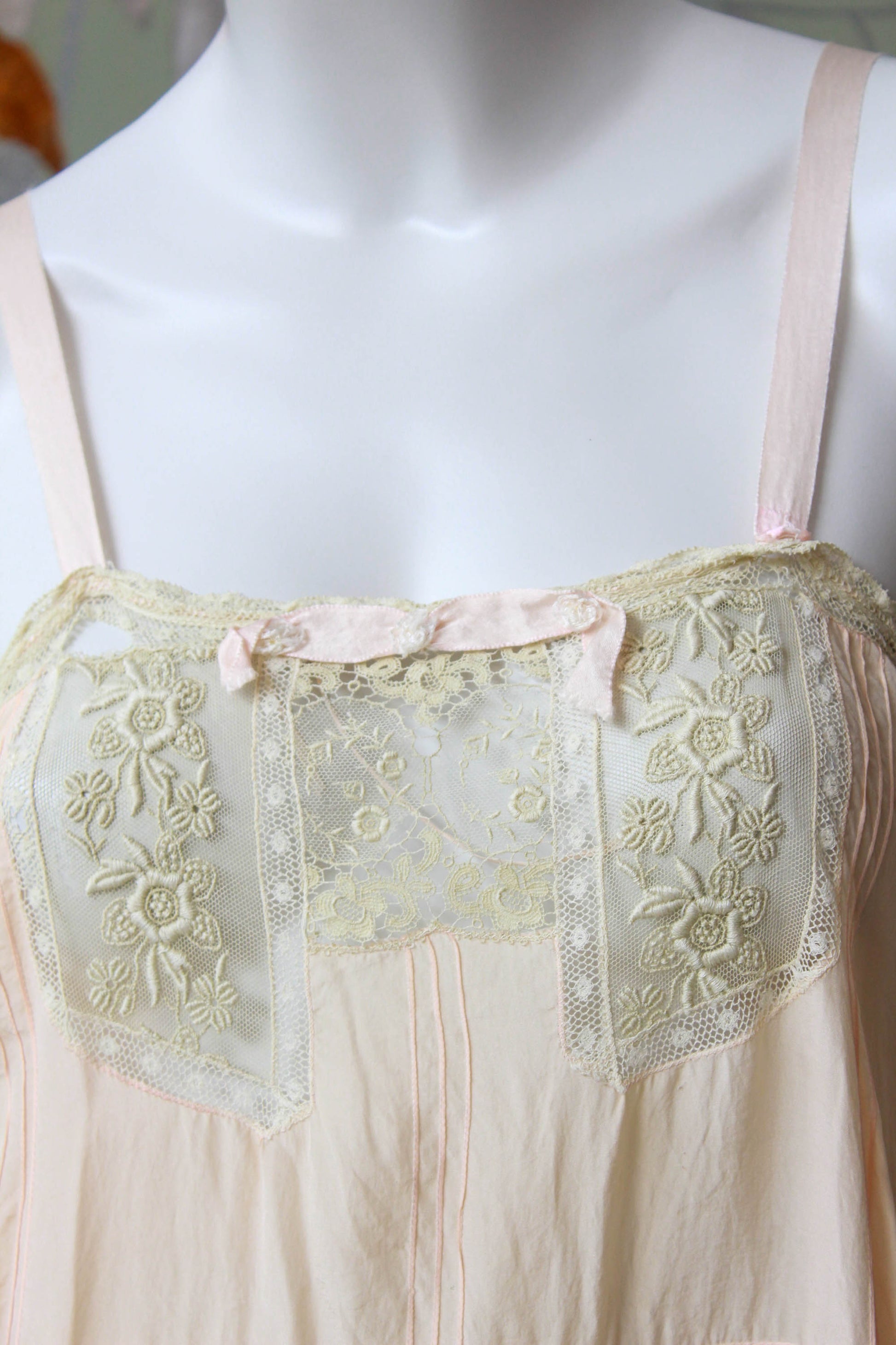 1920s pink silk teddy/step in, with lace insets on bust, small bow and ribbon straps. lace trim, antique lingerie 