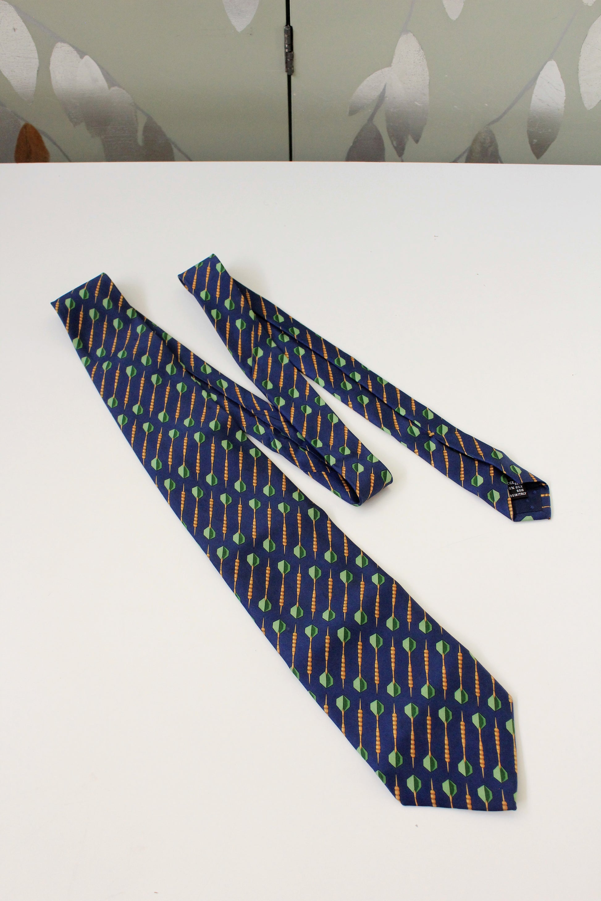 1990s Gucci Navy Blue With Repeating Darts Designer Silk Tie