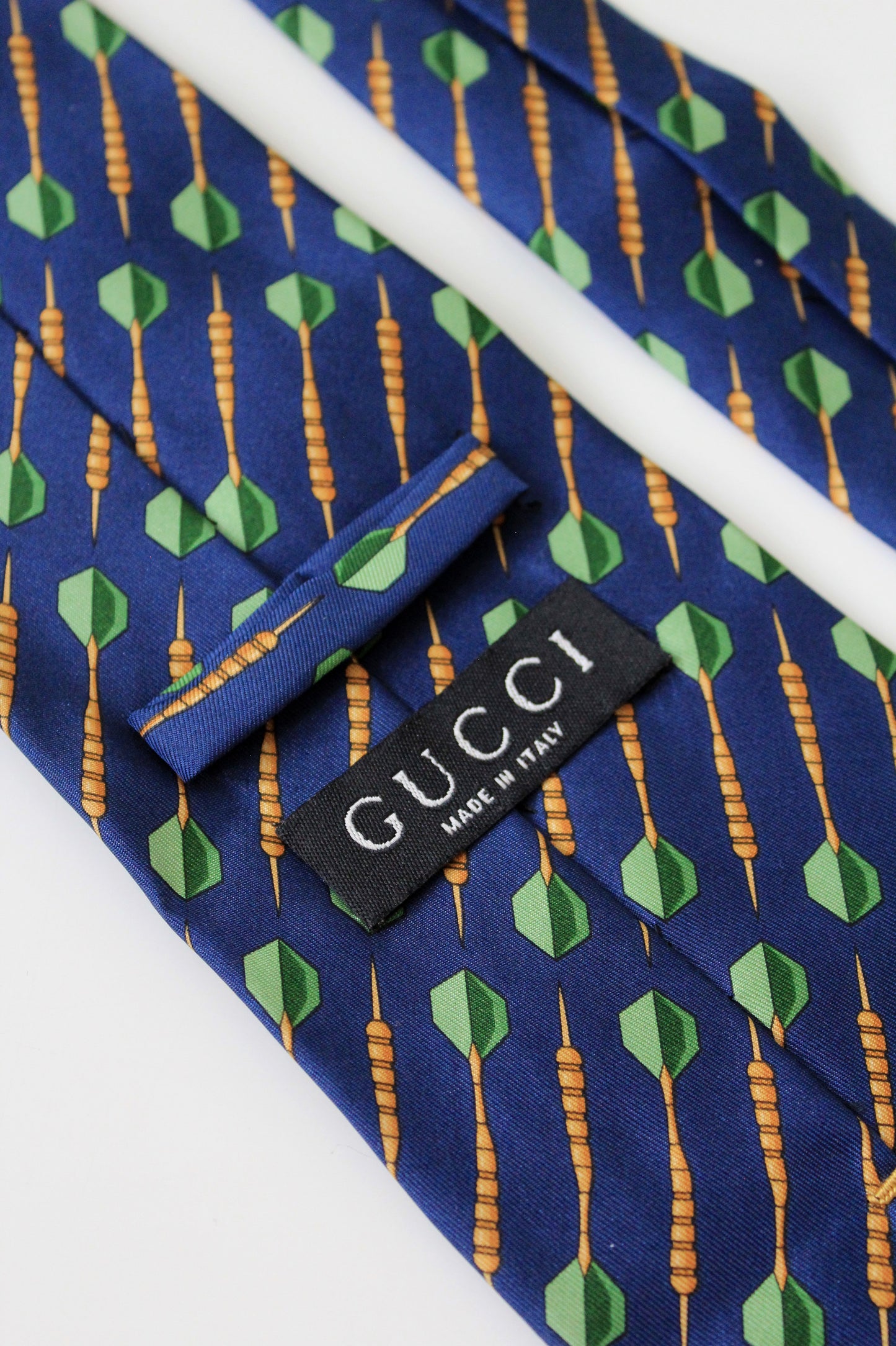 1990s Gucci Navy Blue With Repeating Darts Designer Silk Tie