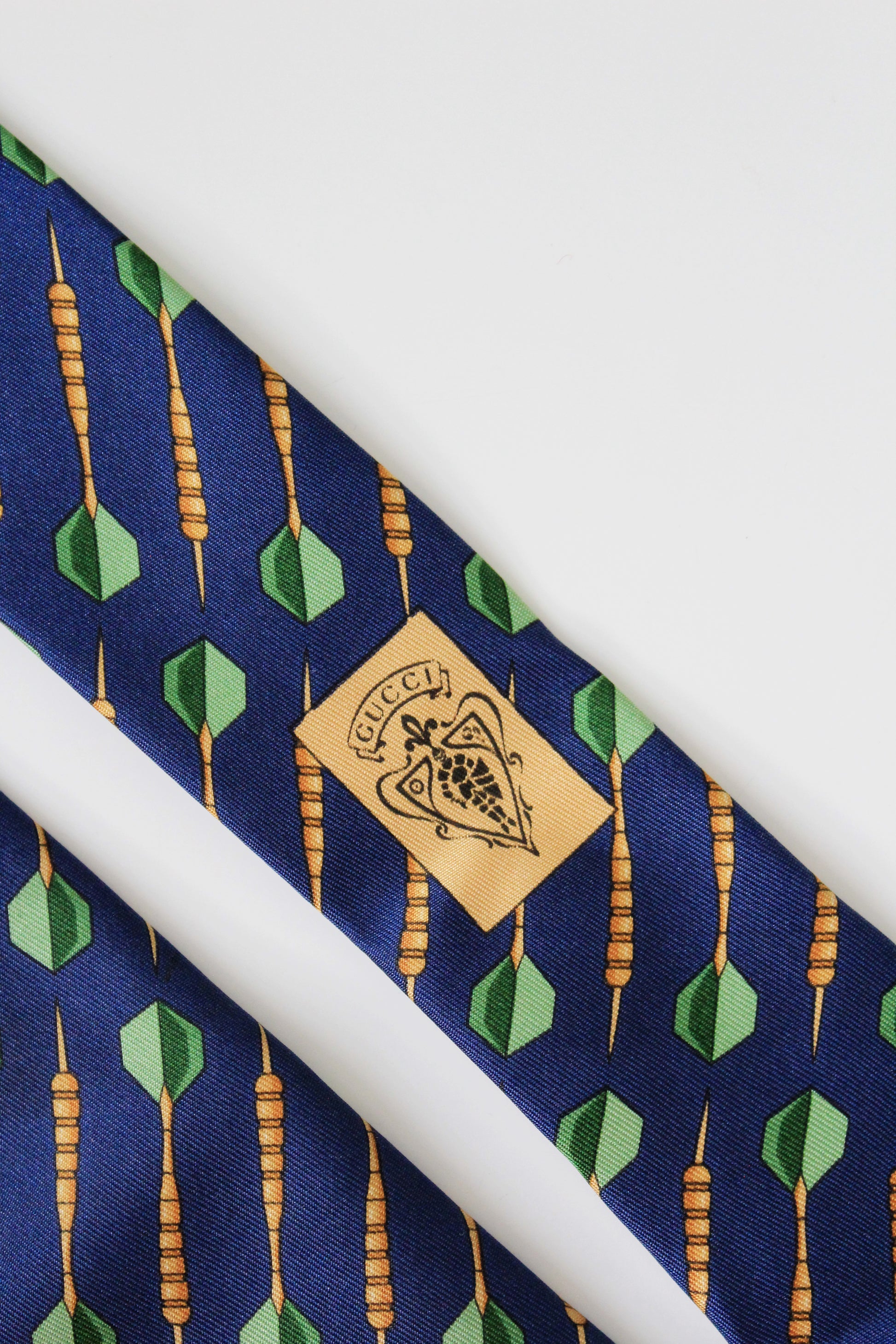 1990s Gucci Navy Blue With Repeating Darts Designer Silk Tie