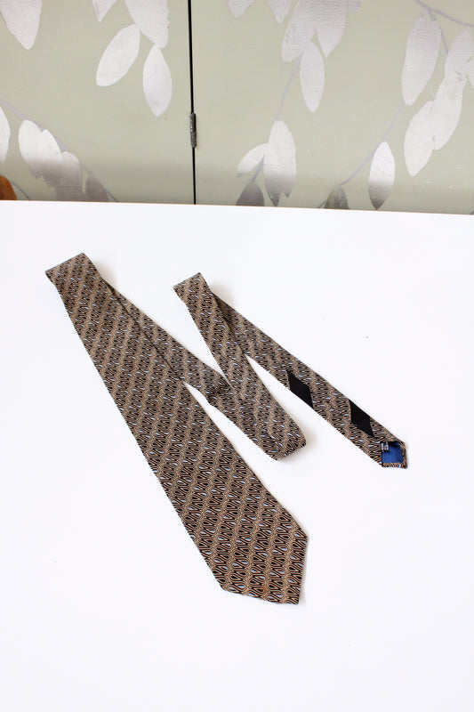 1990s Krizia Beige/Black/Blue Swirl Pattern Silk Designer Tie