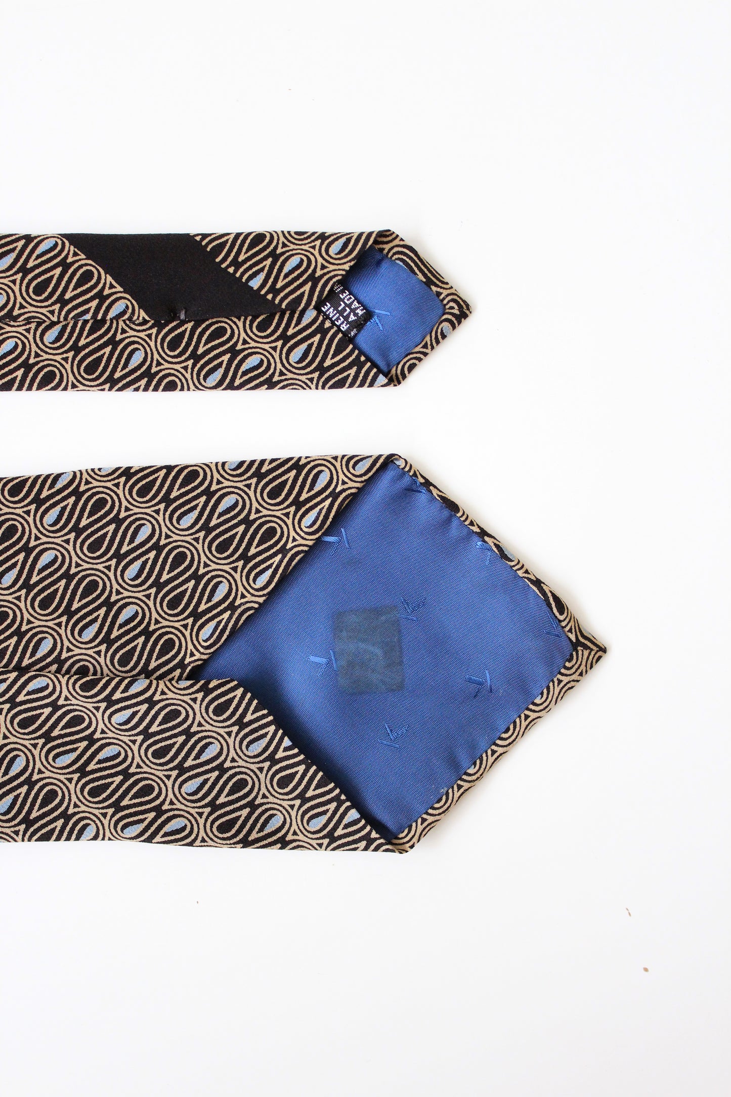 1990s Krizia Beige/Black/Blue Swirl Pattern Silk Designer Tie