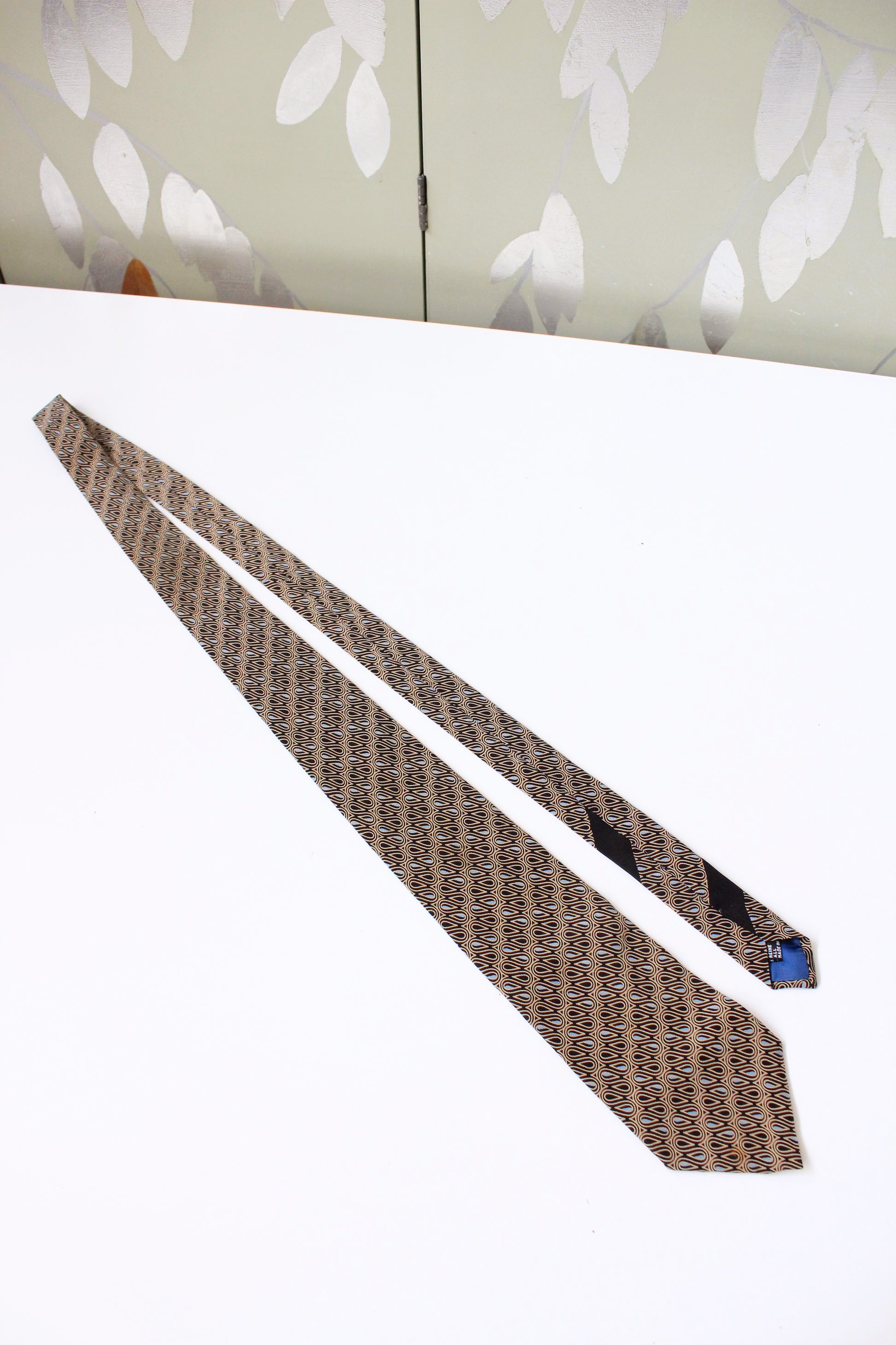 1990s Krizia Beige/Black/Blue Swirl Pattern Silk Designer Tie