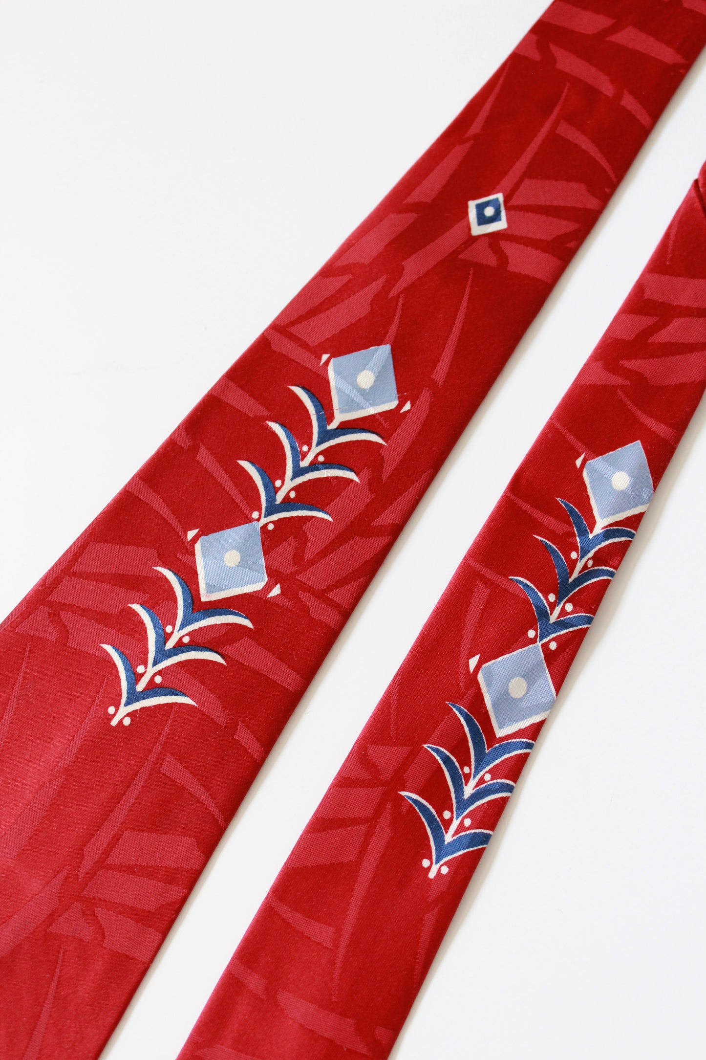 Vintage Early 1950s Rayon Tie In Red With Light Blue Symmetrical Design