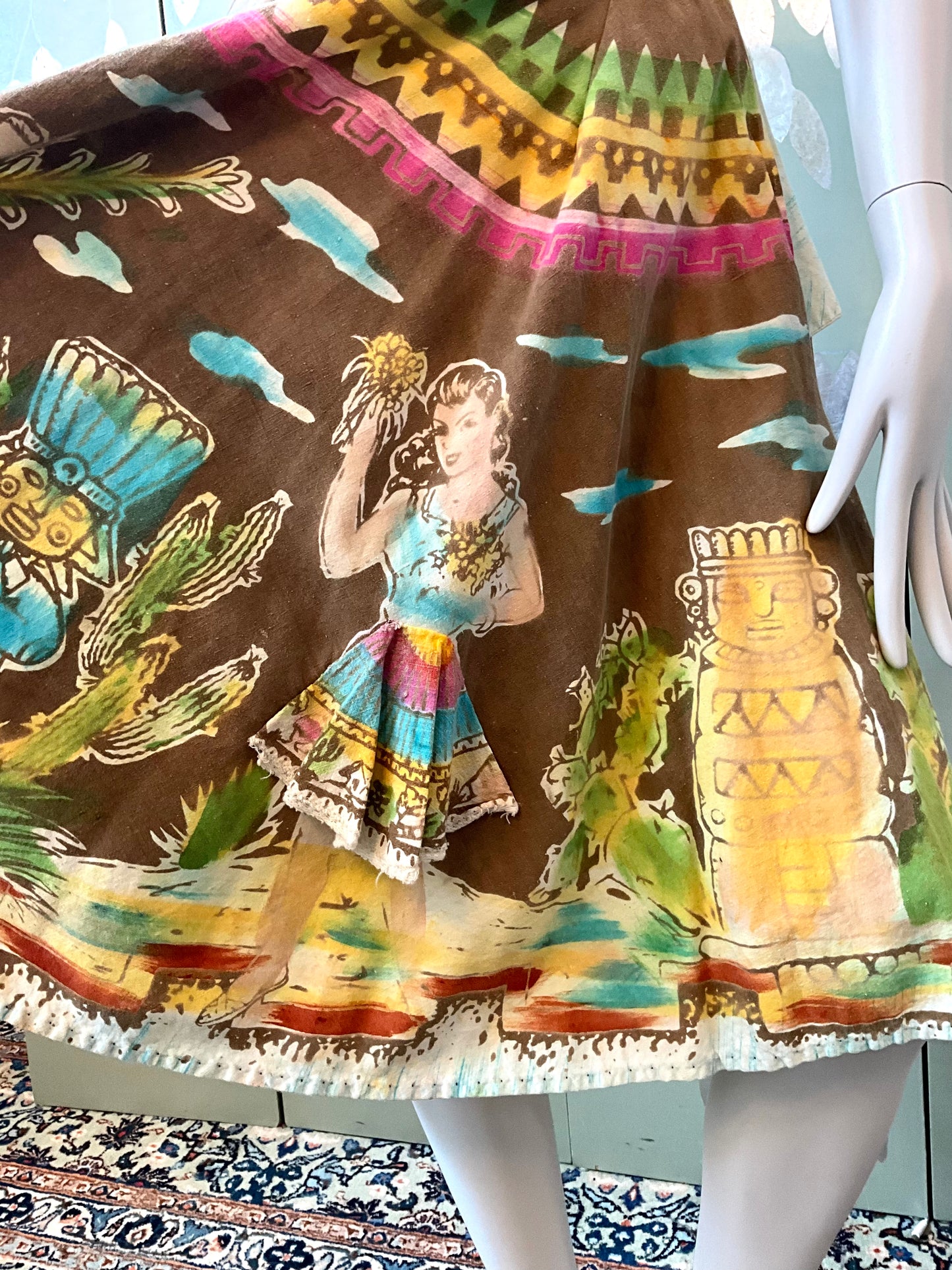 Colorful skirt with a vintage-style design featuring a woman and tribal elements.