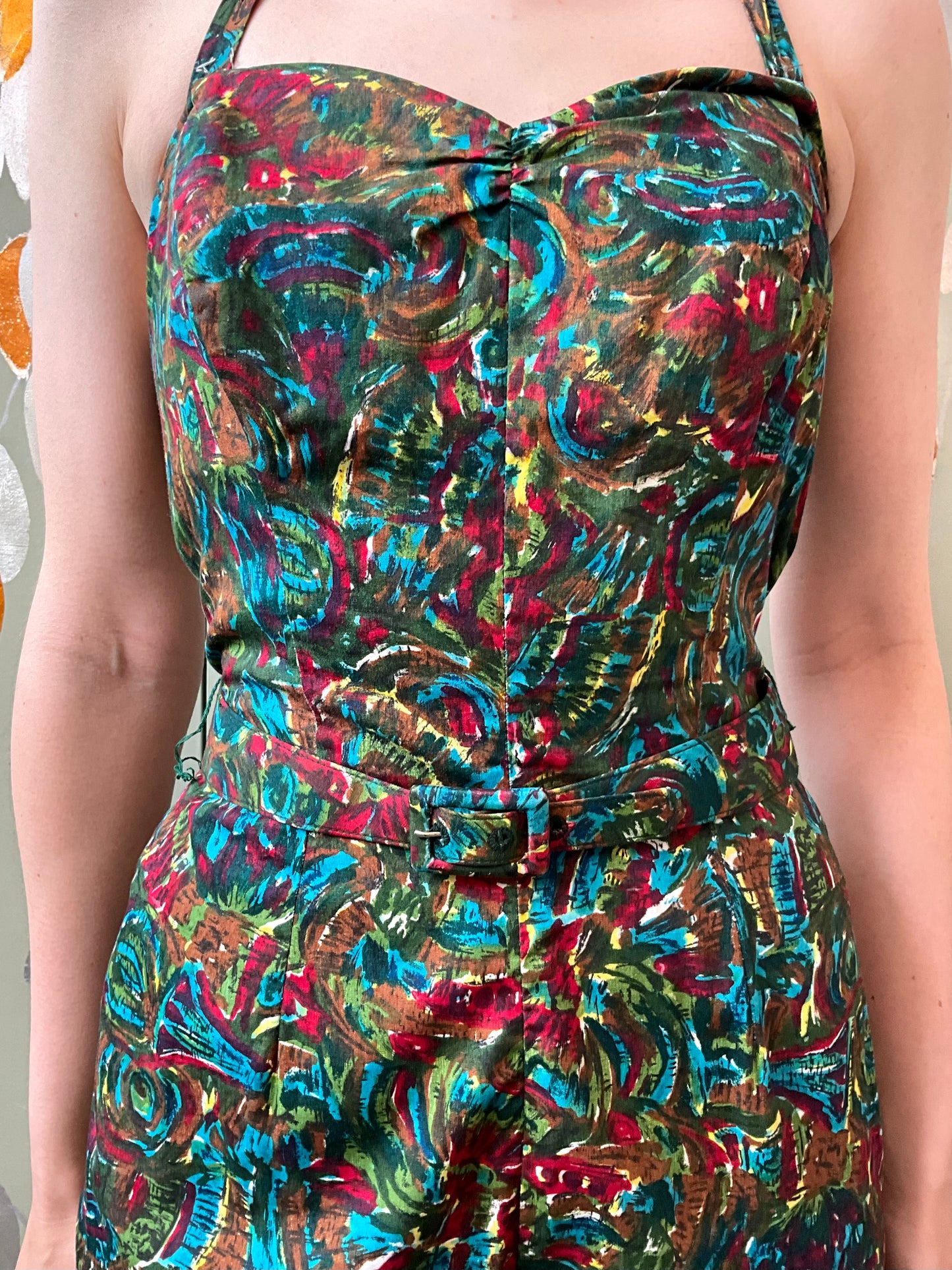 Multicolored patterned jumpsuit worn by a person