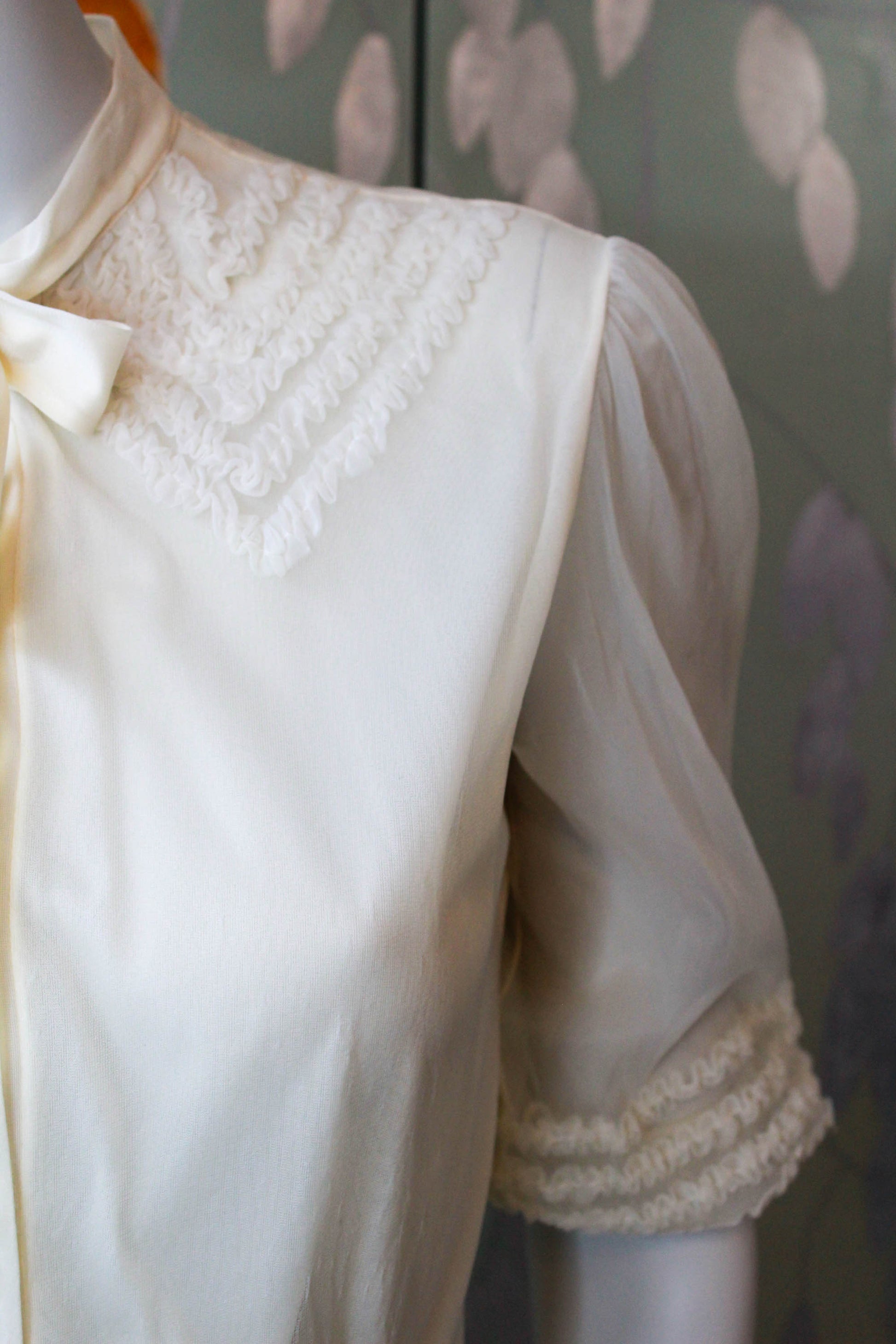 1950s nylon chiffon cream blouse with puff sleeves and faux ruffle appliqued collar design with tie neckline, sheer puff sleeves and clear rhinestone buttons vintage coquette aesthetic romantic feminine blouse