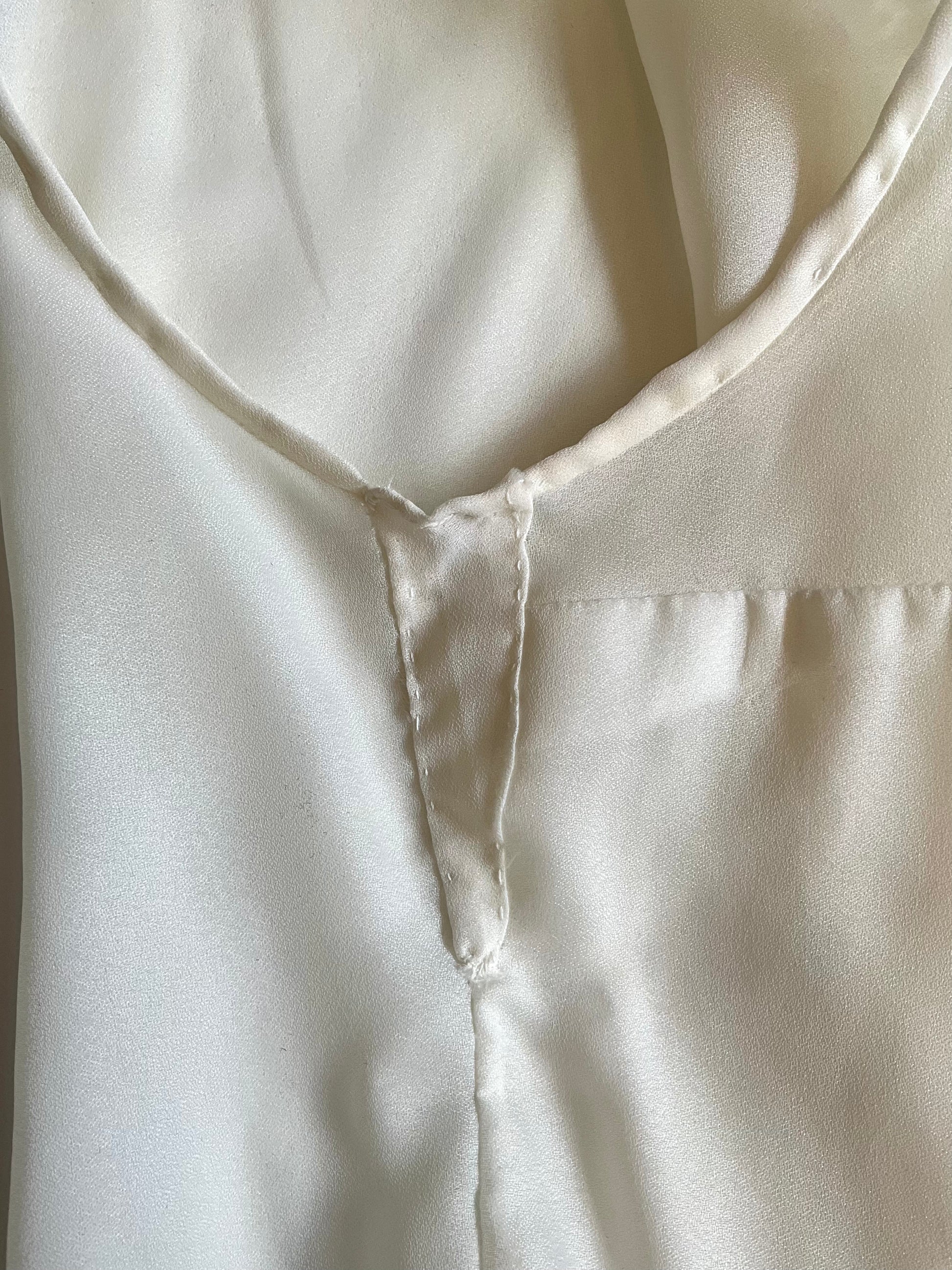 Close-up of a cream fabric with a subtle texture
