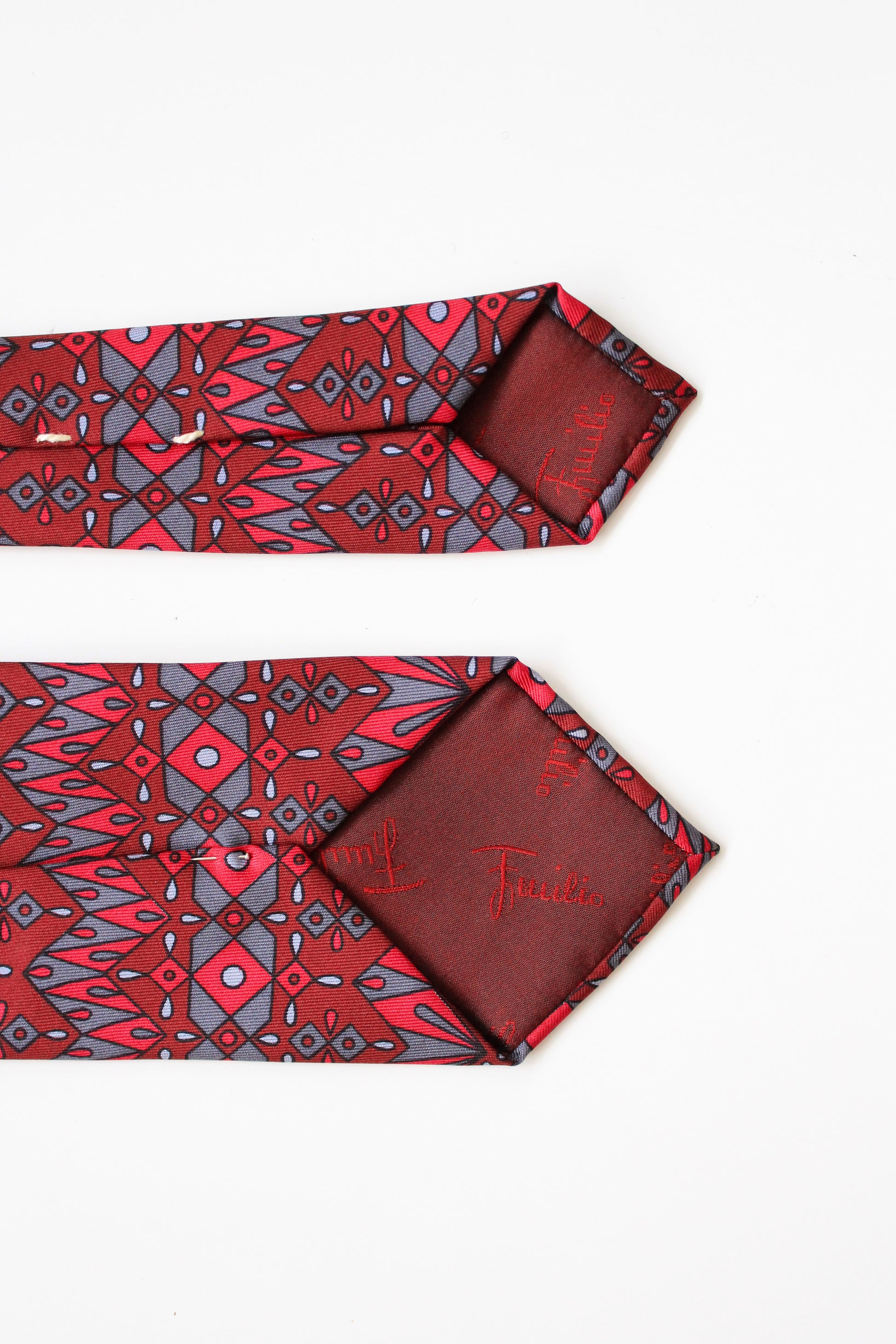 1990s Emilio Pucci Burgundy And Red Geometric Print Designer Silk Tie