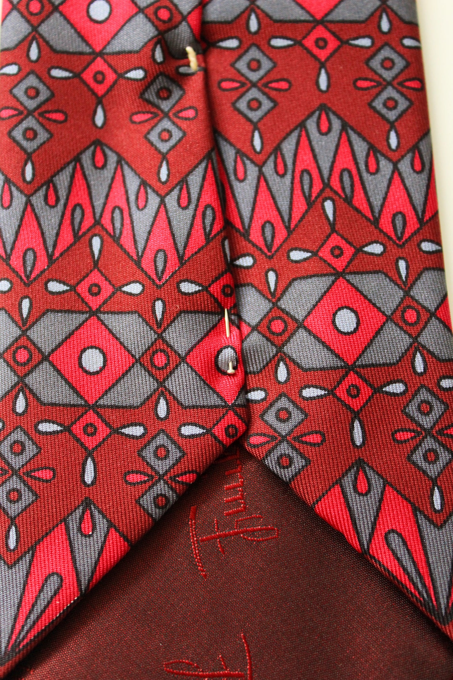 1990s Emilio Pucci Burgundy And Red Geometric Print Designer Silk Tie