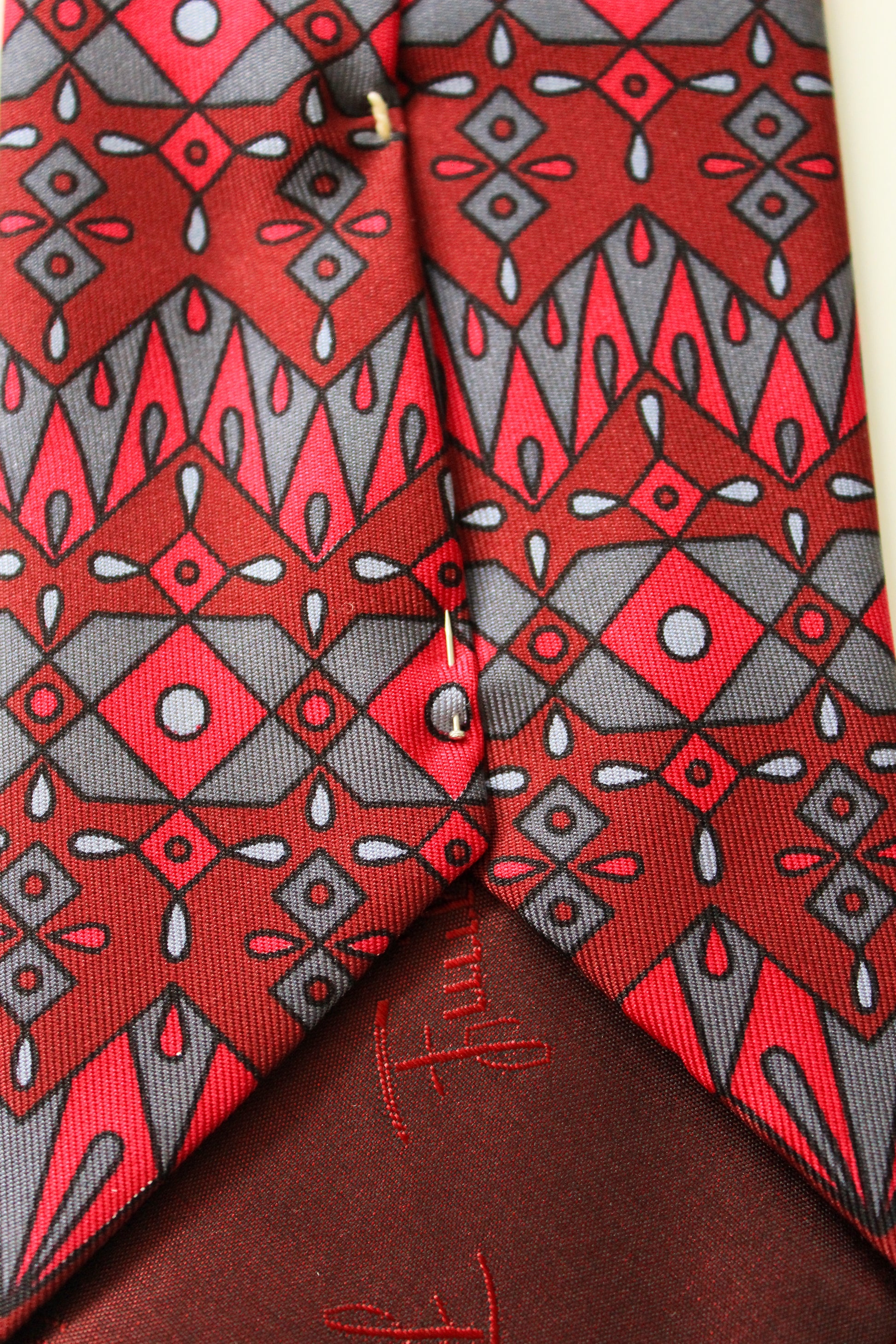1990s Emilio Pucci Burgundy And Red Geometric Print Designer Silk Tie