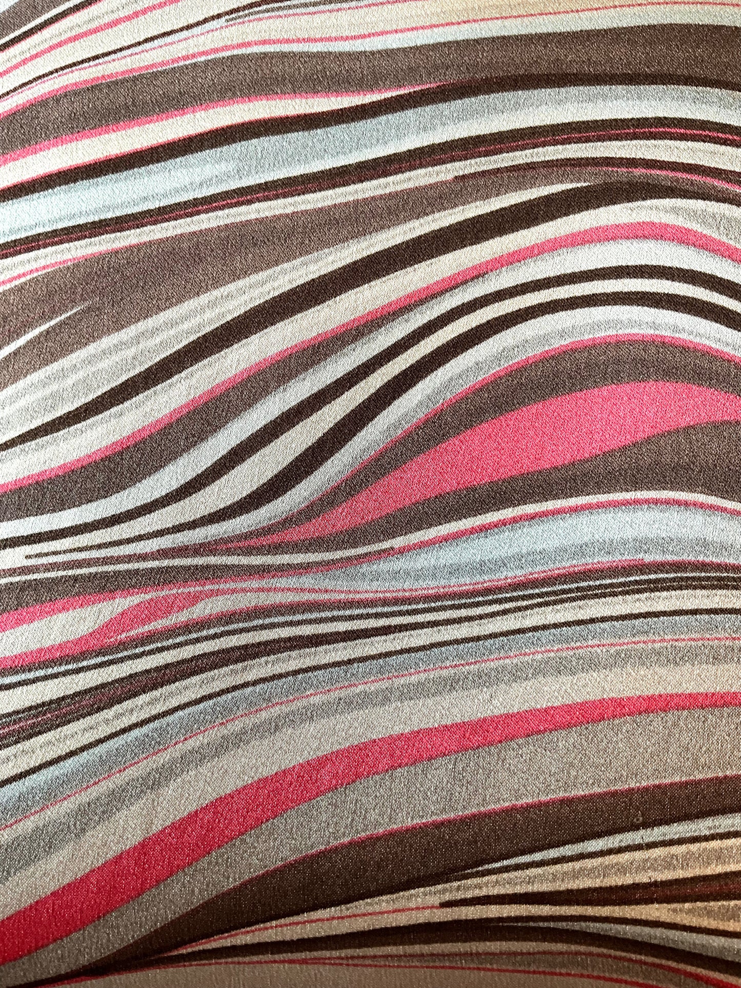 Close-up of fabric with wavy multicolored pattern