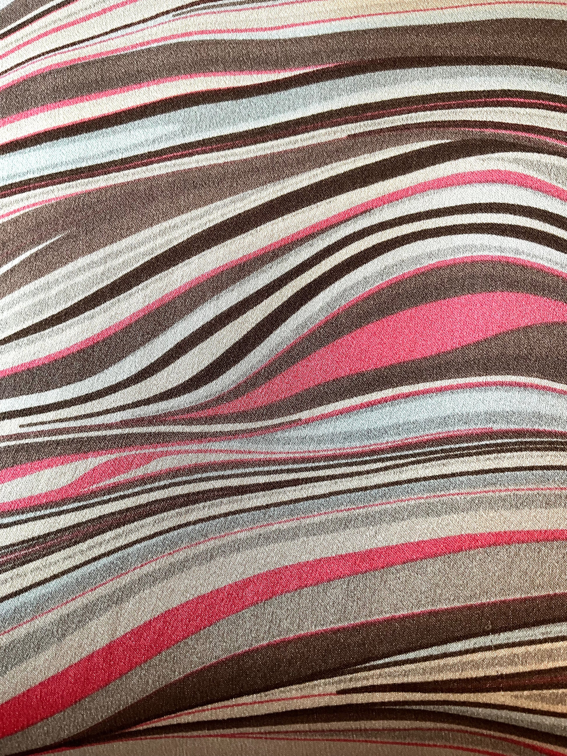 Close-up of fabric with wavy multicolored pattern