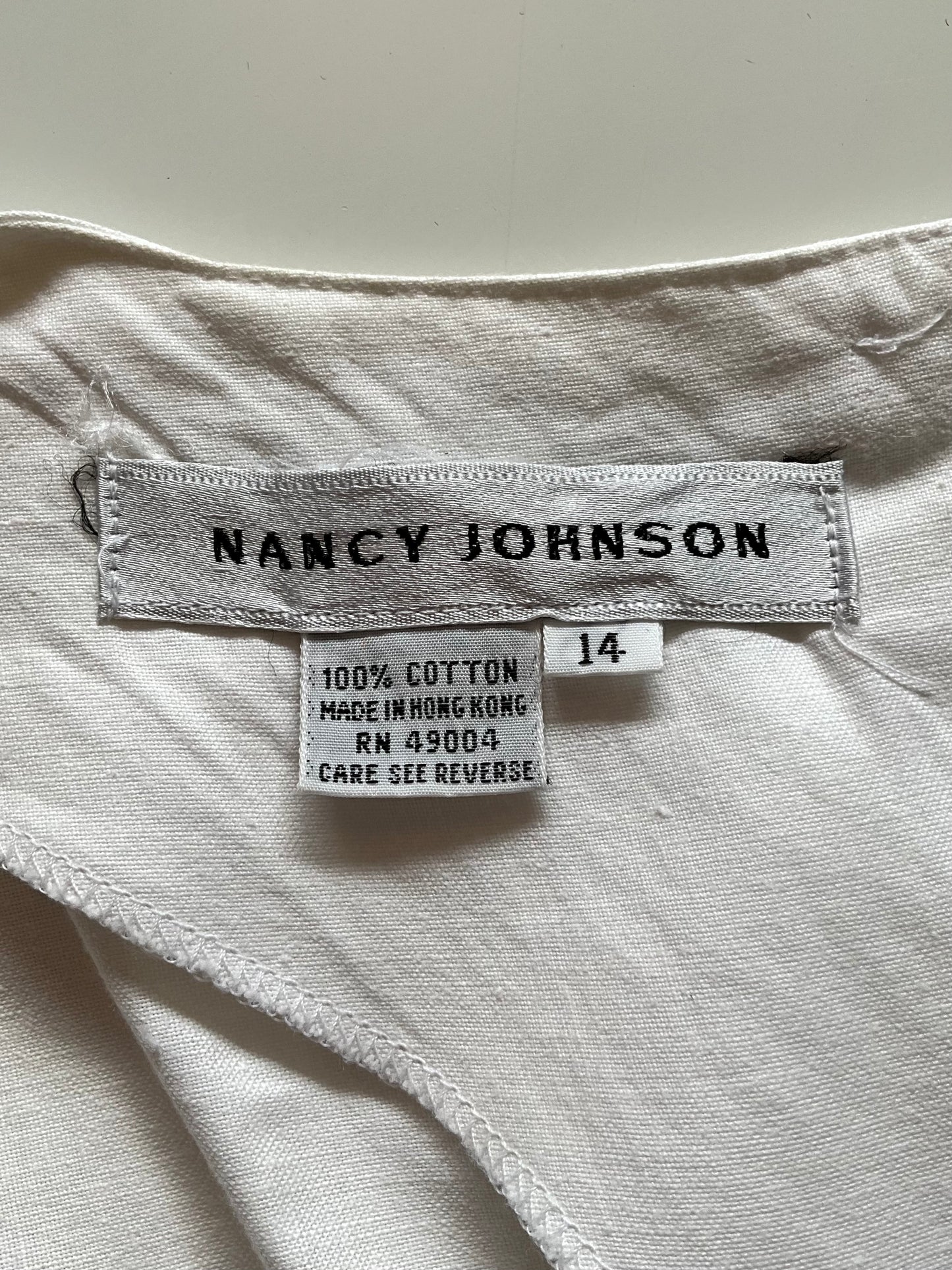 Nancy Johnson label on a garment with size 14