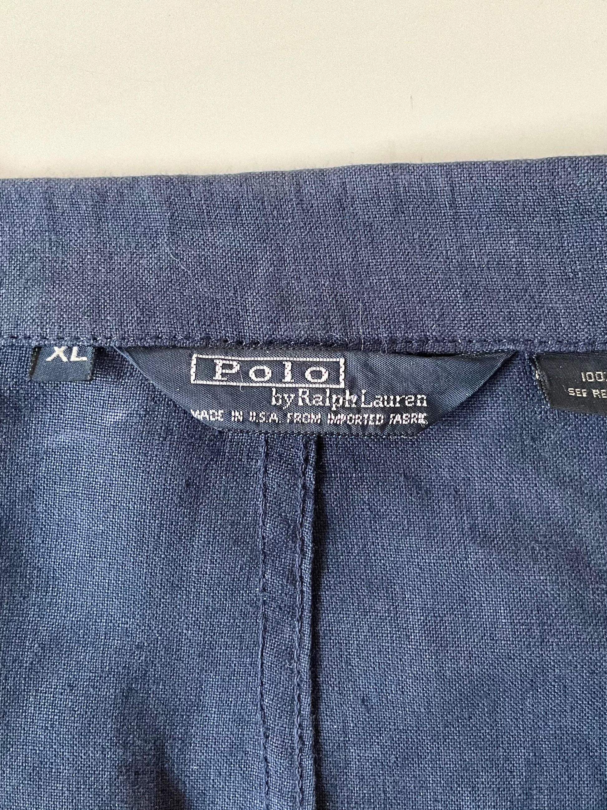 Close-up of Polo Ralph Lauren label on a blue fabric background