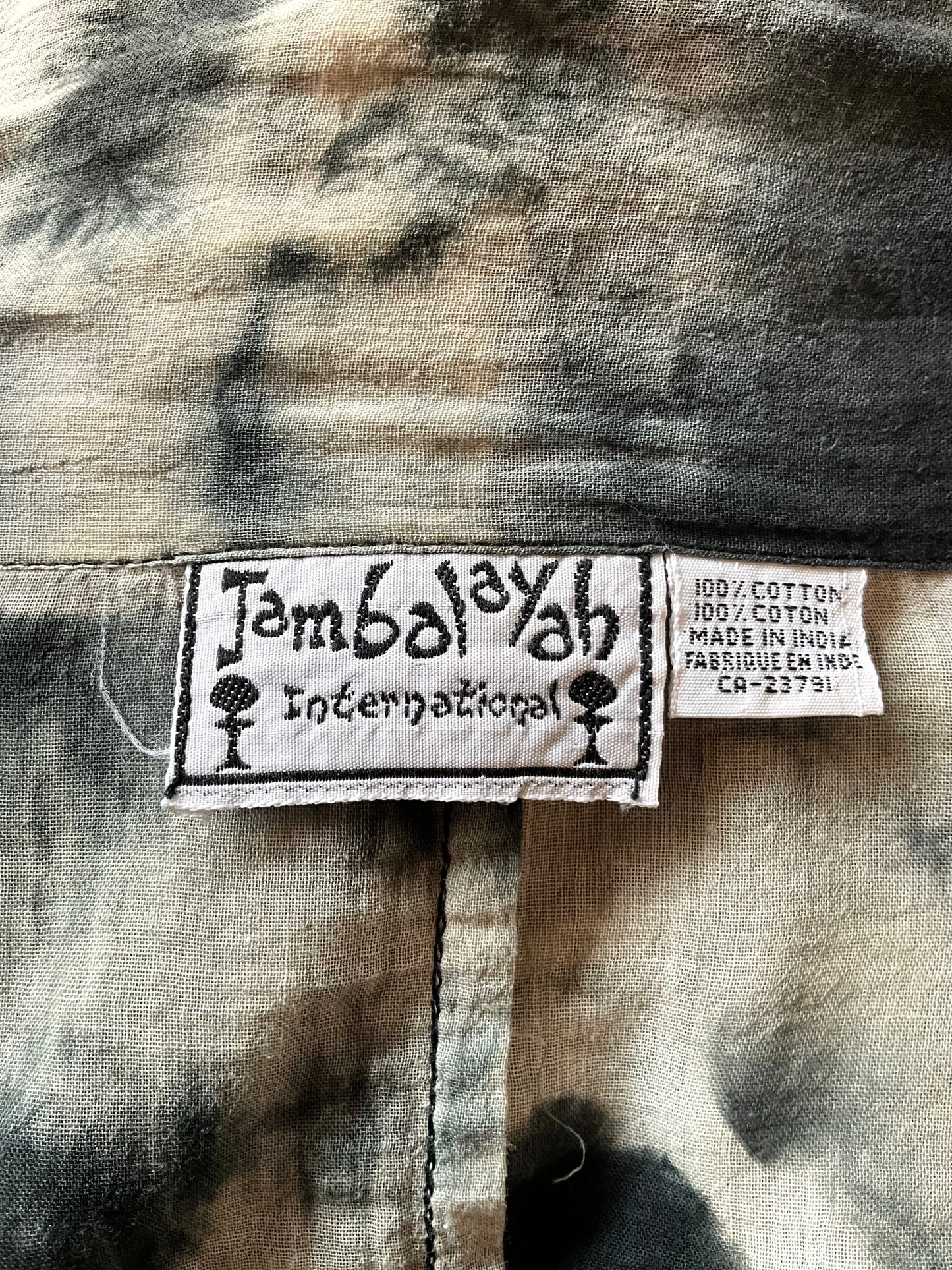 Close-up of a label on a piece of fabric with 'Jambalayah International' branding.