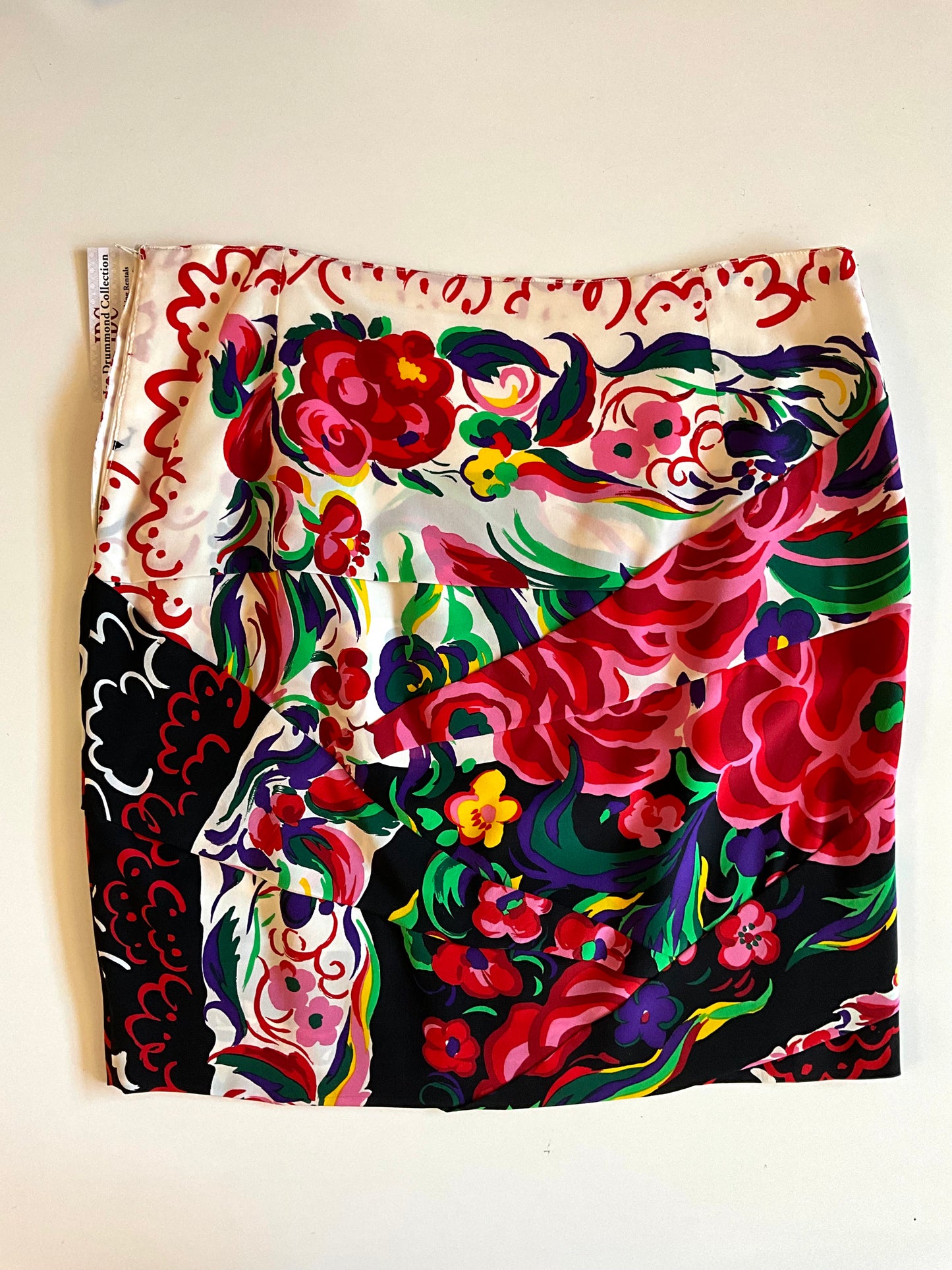 Colorful floral patterned skirt on a white background