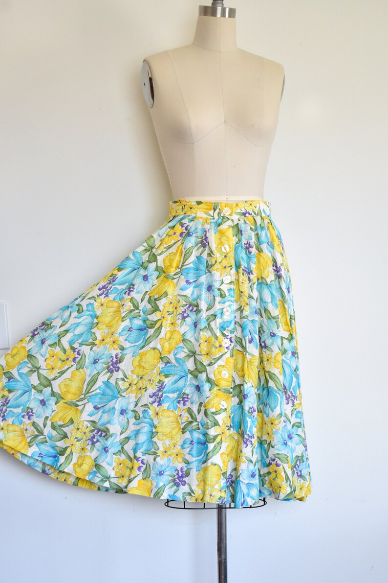 1950s j tiktiner blue and yellow floral print linen cotton blend skirt with button front, gathered waist