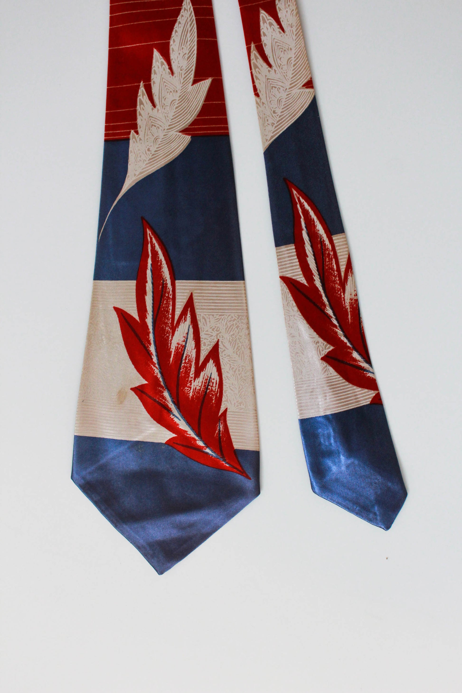 1940s rayon necktie blue, beige and red with large falling leaf pattern, by fashion craft, 1940s wide tongue bold look vintage tie