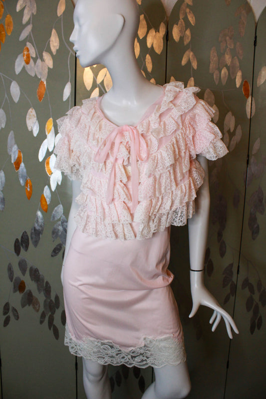 1950s pink and white lace layered ruffle bed jacket with bow tie at neck by linda underpinnings coquette fashion coquette style