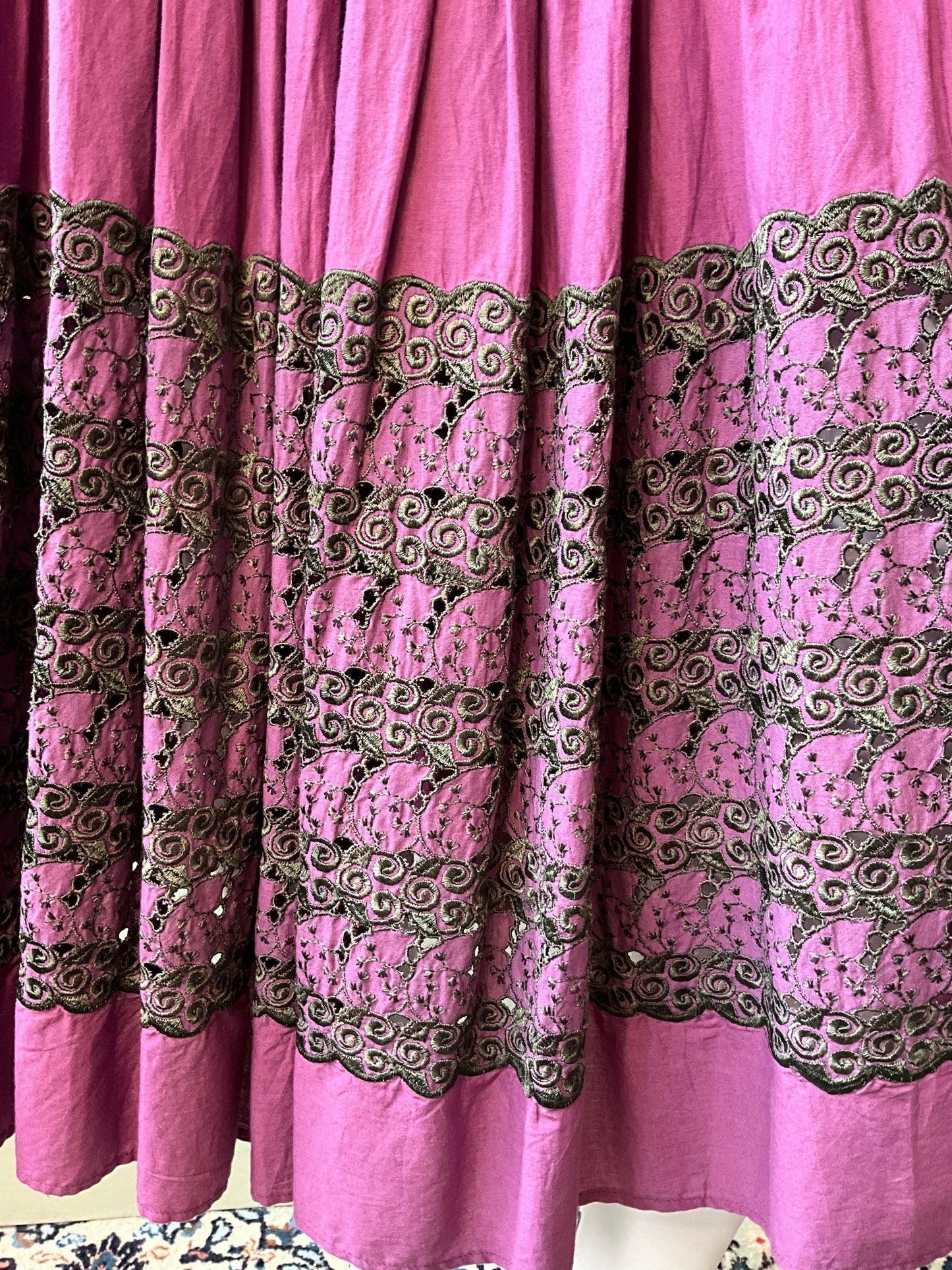 Purple skirt hem with intricate black lace detailing