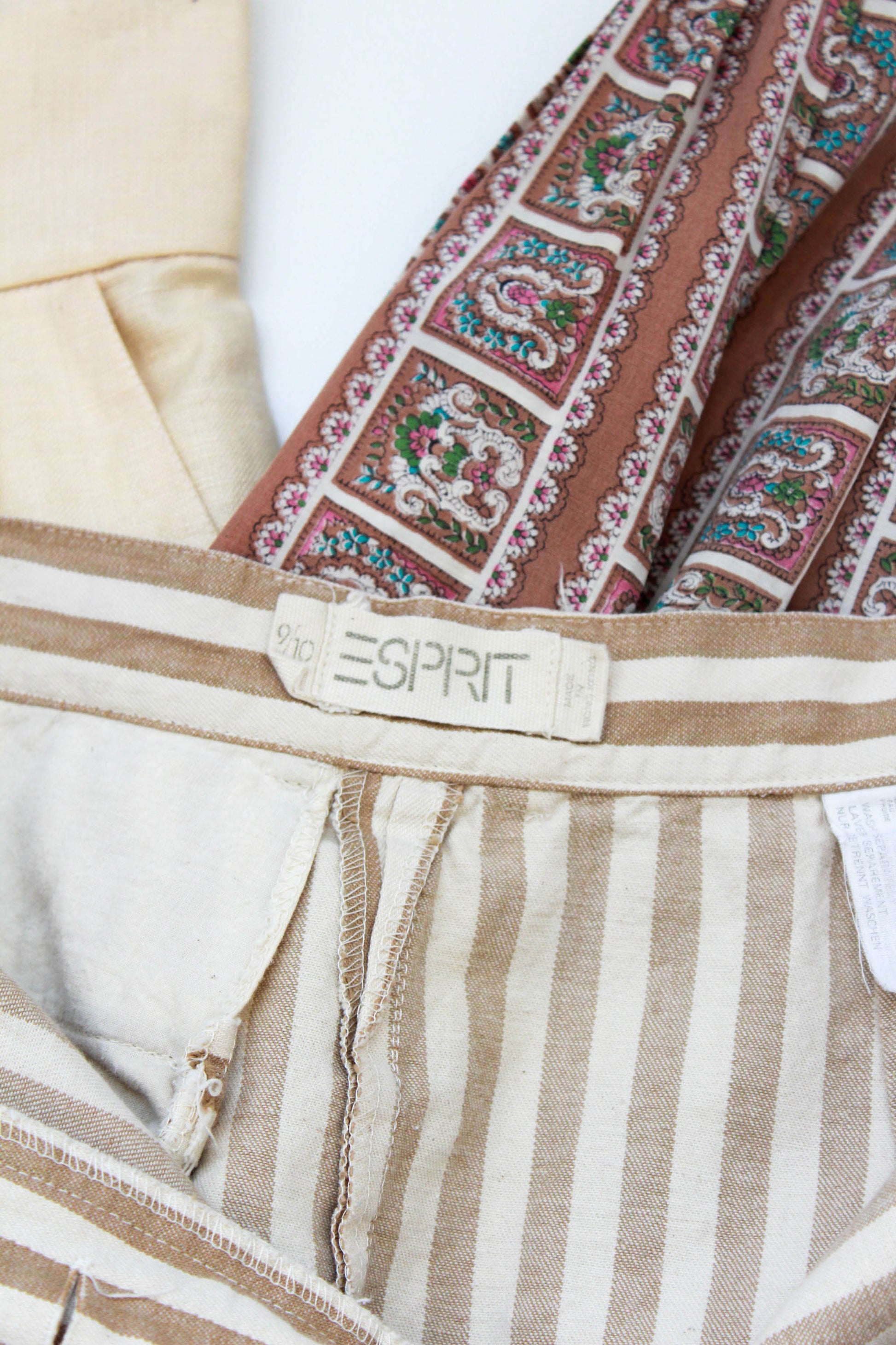 1980s taupe and beige striped midi length high waisted skirt by Esprit with button fly and straight fit