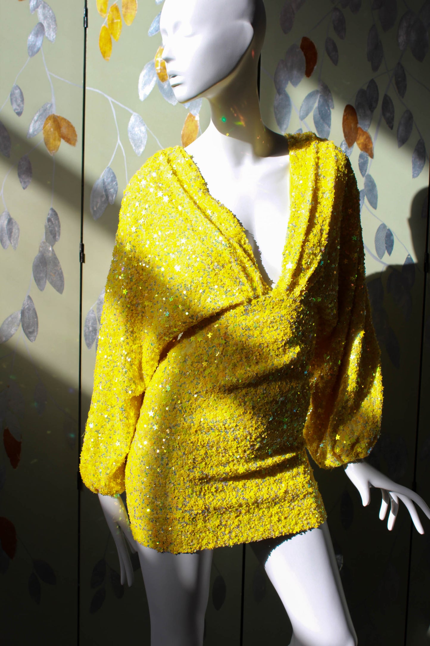 bright yellow star sequinned mini dress with plunging V neck by Retrofete 