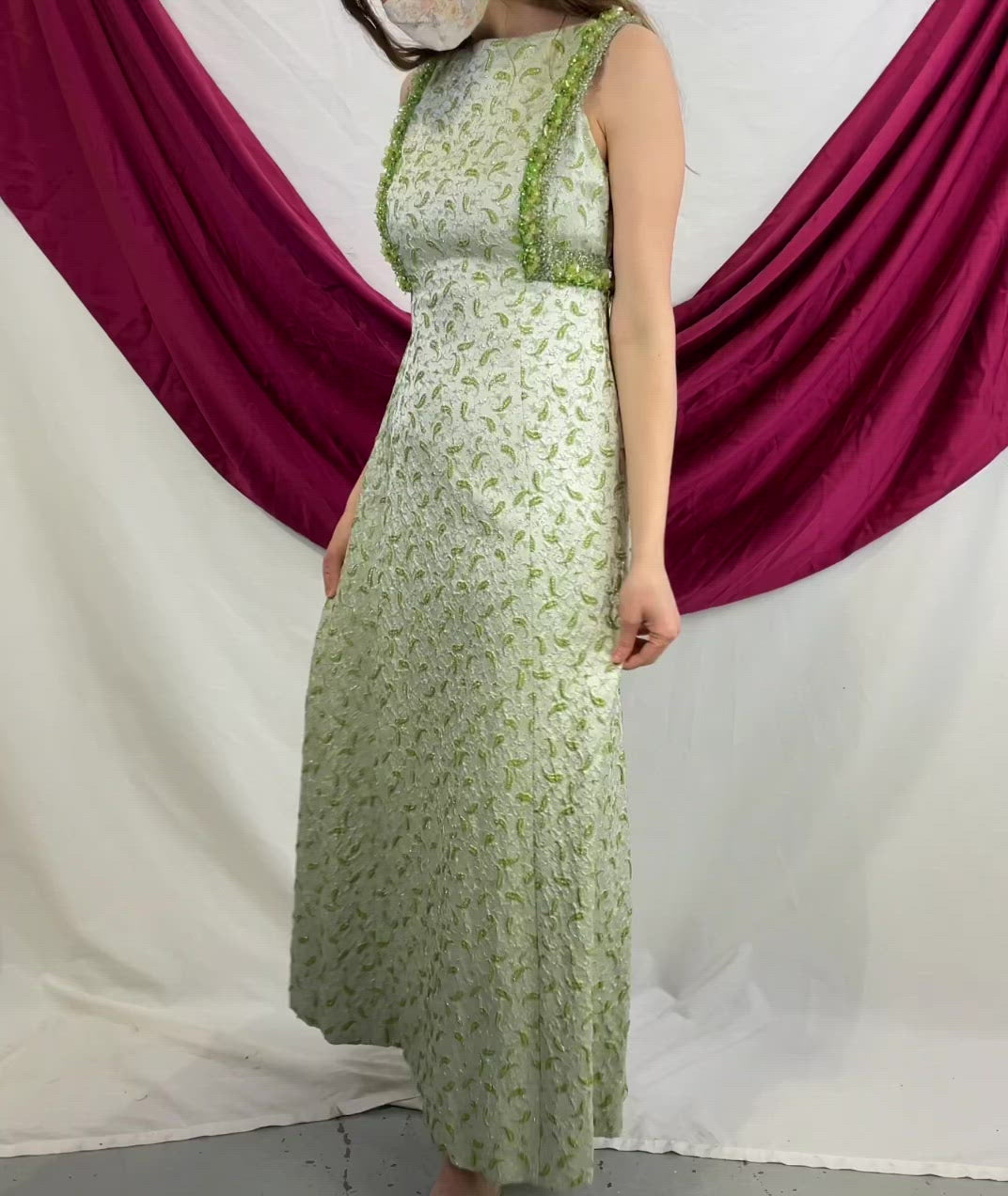 Video of green 60s paisley green & silver beaded gown. Ian Drummond Vintage. 
