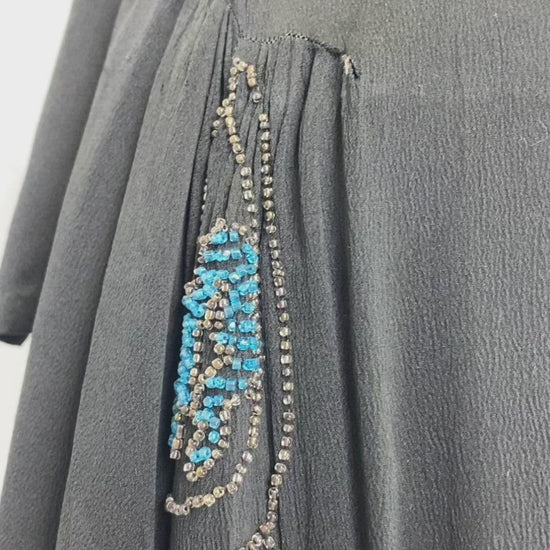 Video of beadwork and capelet on vintage 1920s black silk  dress. Ian Drummond Vintage. 