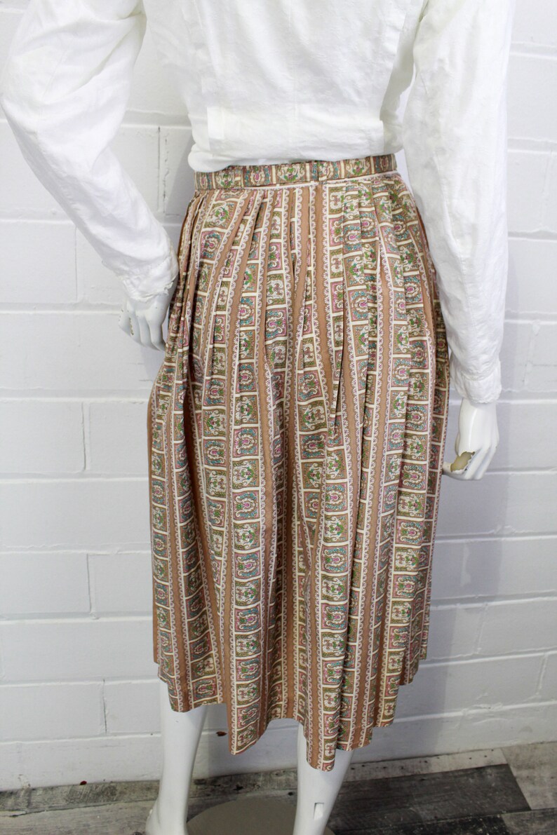 1950s floral print novelty skirt with matching belt, beige with pink and blue flowers